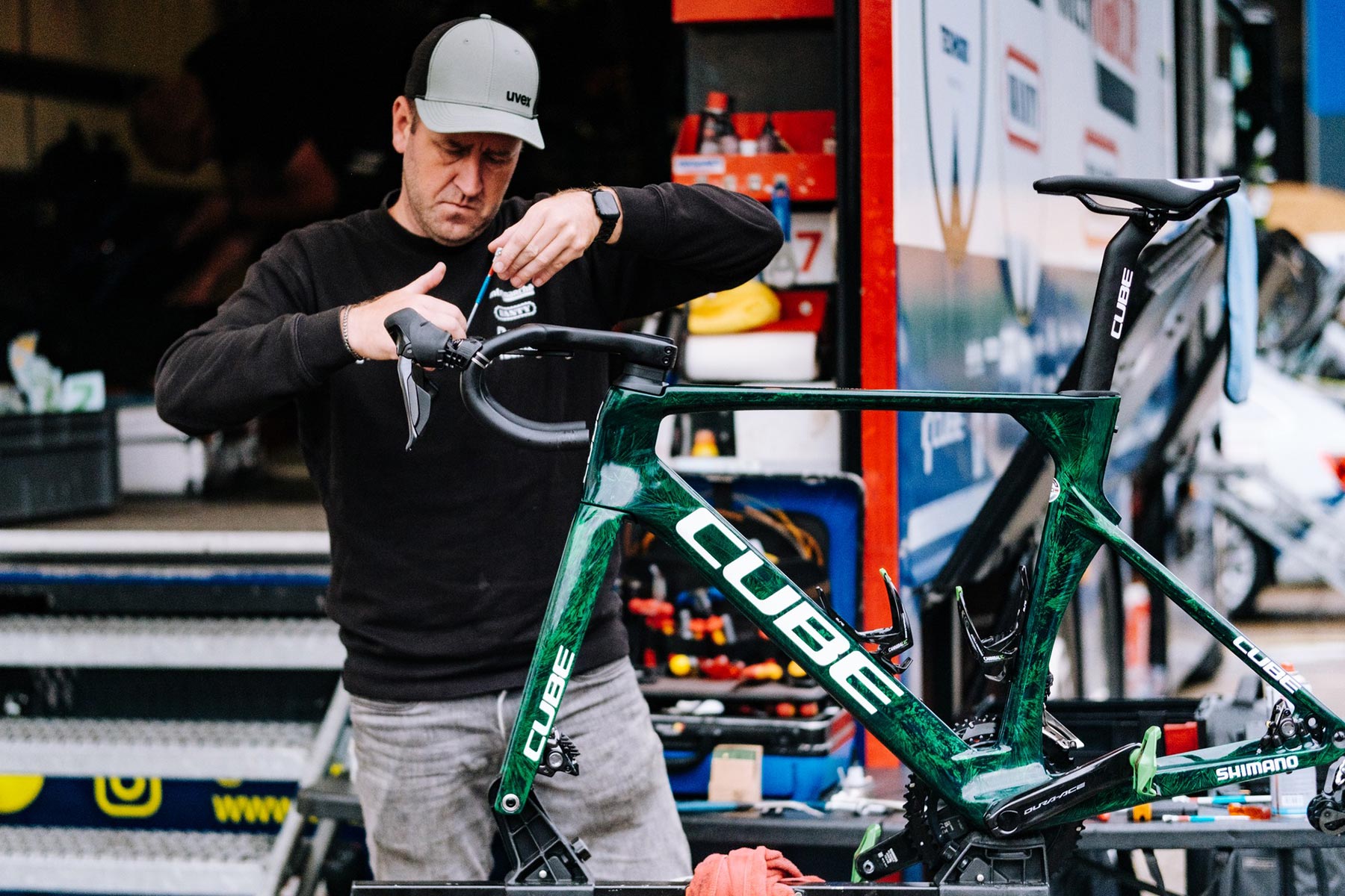 Biniam Girmay 2024 Tour de France Green Jersey winner on Cube Litening Aero TE C:68X aerodynamic road bike, Intermarche-Wanty team mechanic building up the new green bike