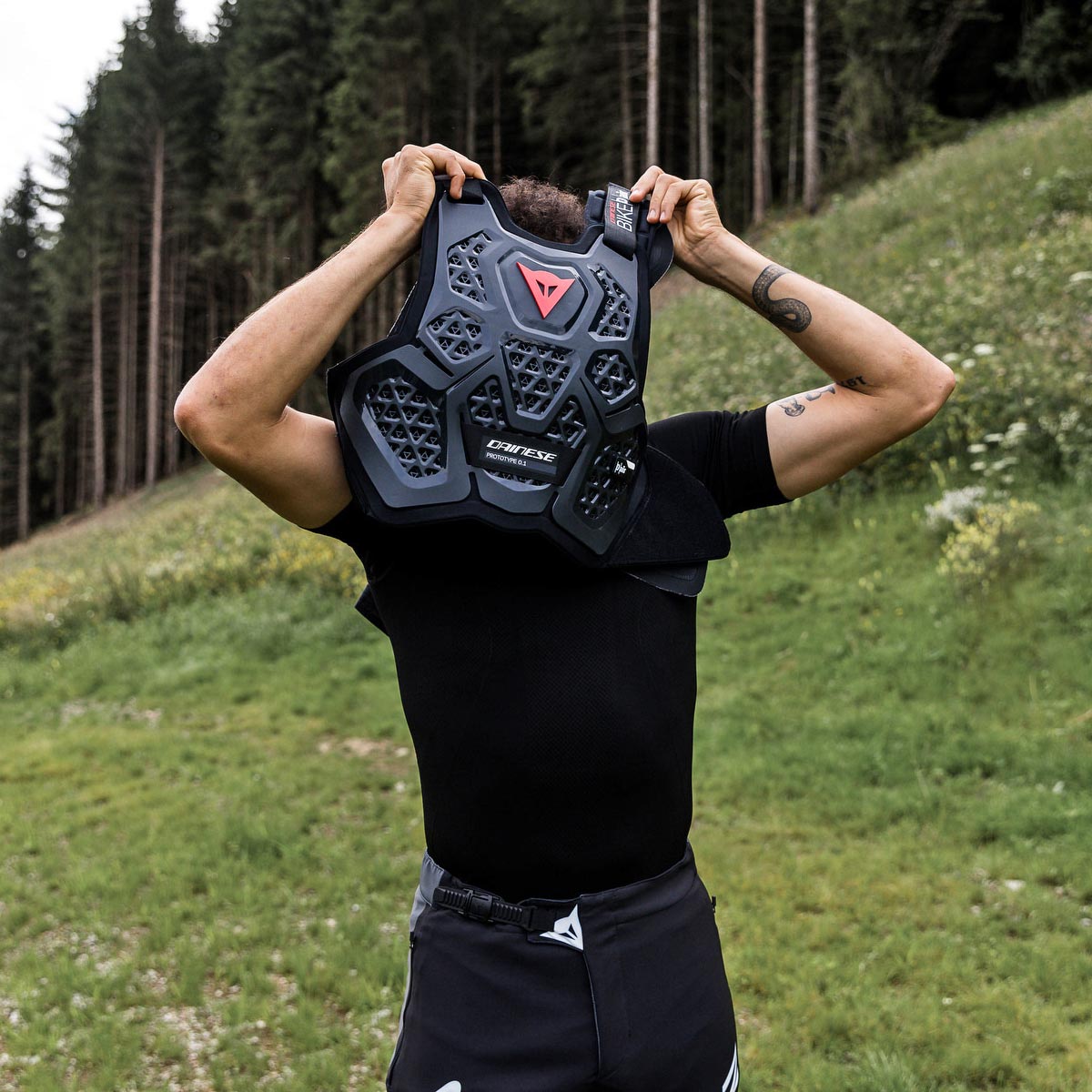 Dainese D-Air Bike Prototype DH airbag inflated chest back neck protector, Dante Silva pulling on new protector vest