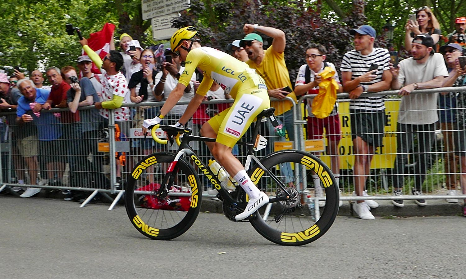 Tadej Pogačar 2024 Tour de France winner, customized Colnago V4Rs road bike, riding to the start