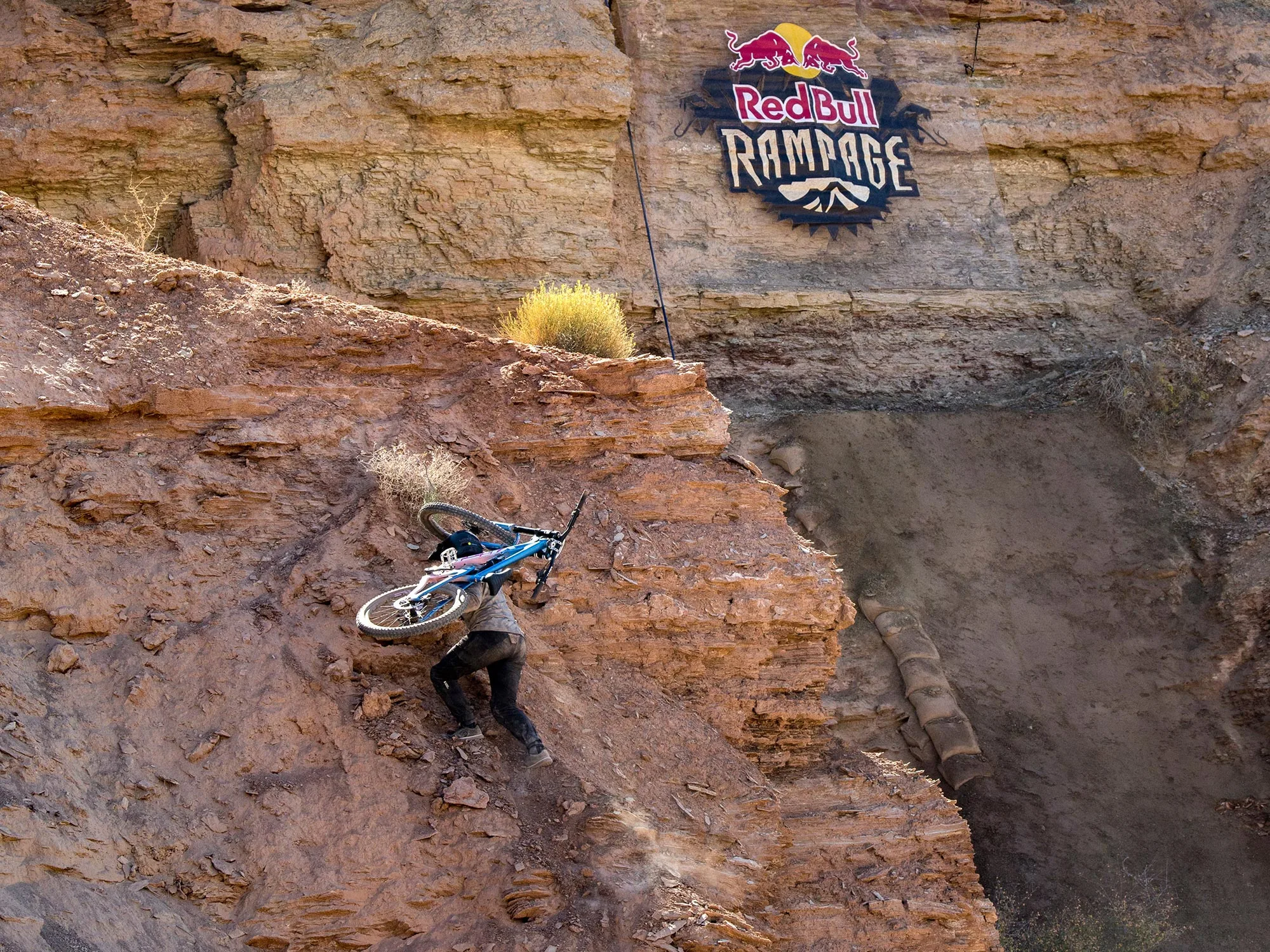 2024 Red Bull Rampage Women take freeride MTB main stage, climbing back up a cliff