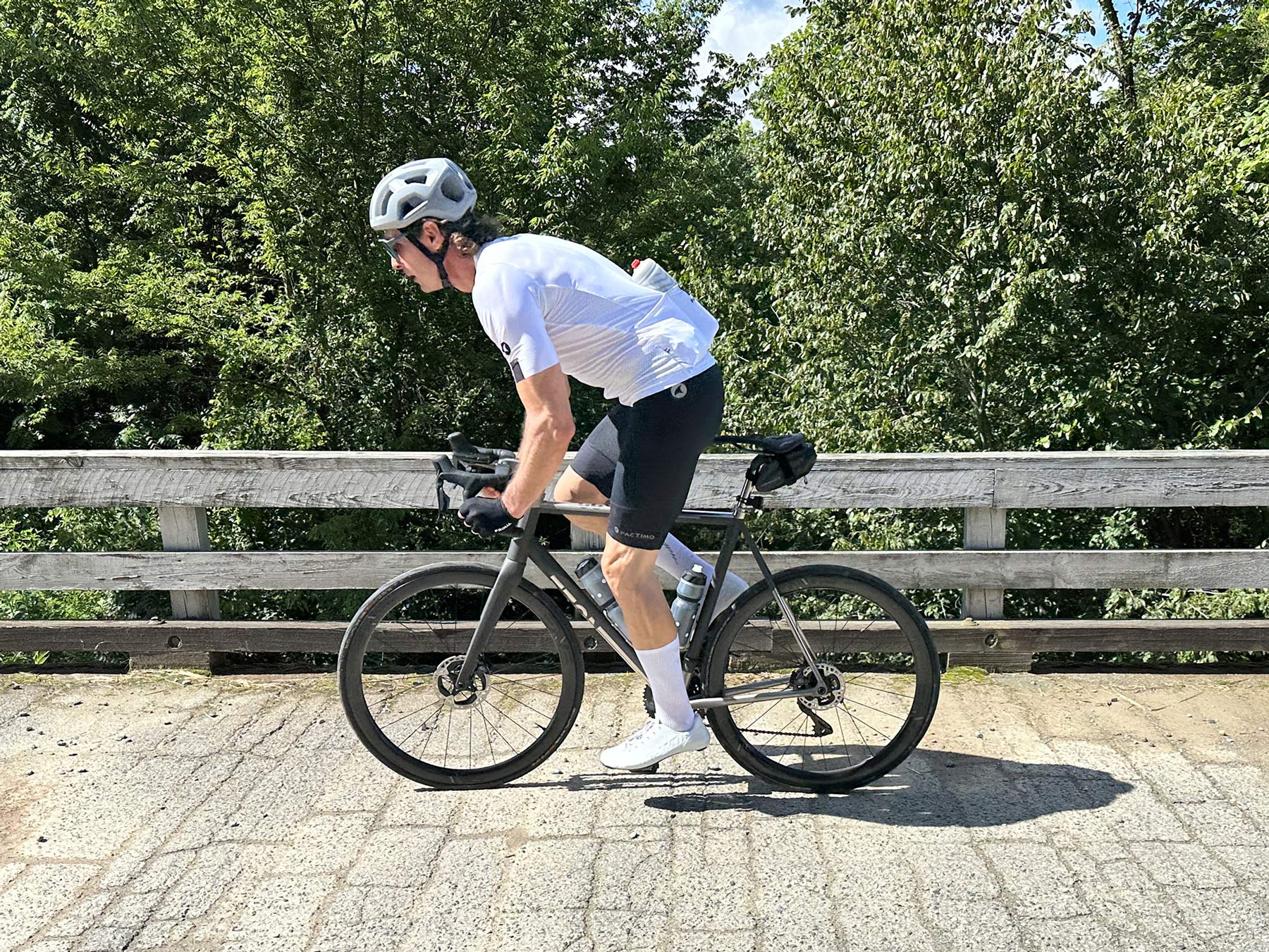 Cyclist riding the No 22 great divide titanium road bike.
