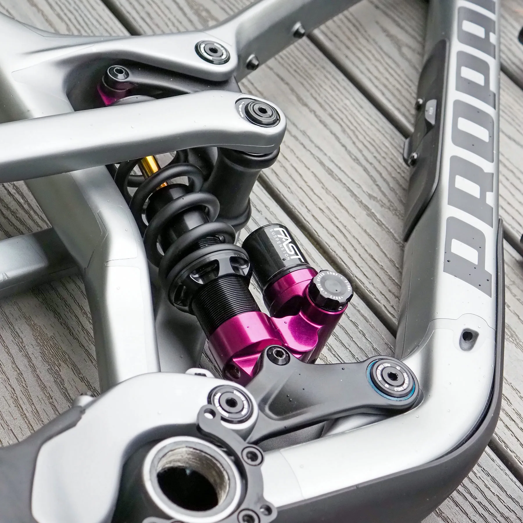 Fast Suspension Fenix 2.0 high-performance enduro mountain bike coil shock, LTD Purple on a Propain frame