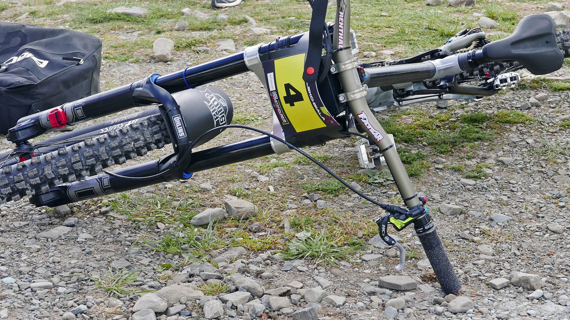 prototype Specialized Demo DH bike with electronically controlled Ohlins suspension prototypes, a DH38 with lightweight clamps, and that colorful video game-like remote controlled and 3 colored indicator LEDs