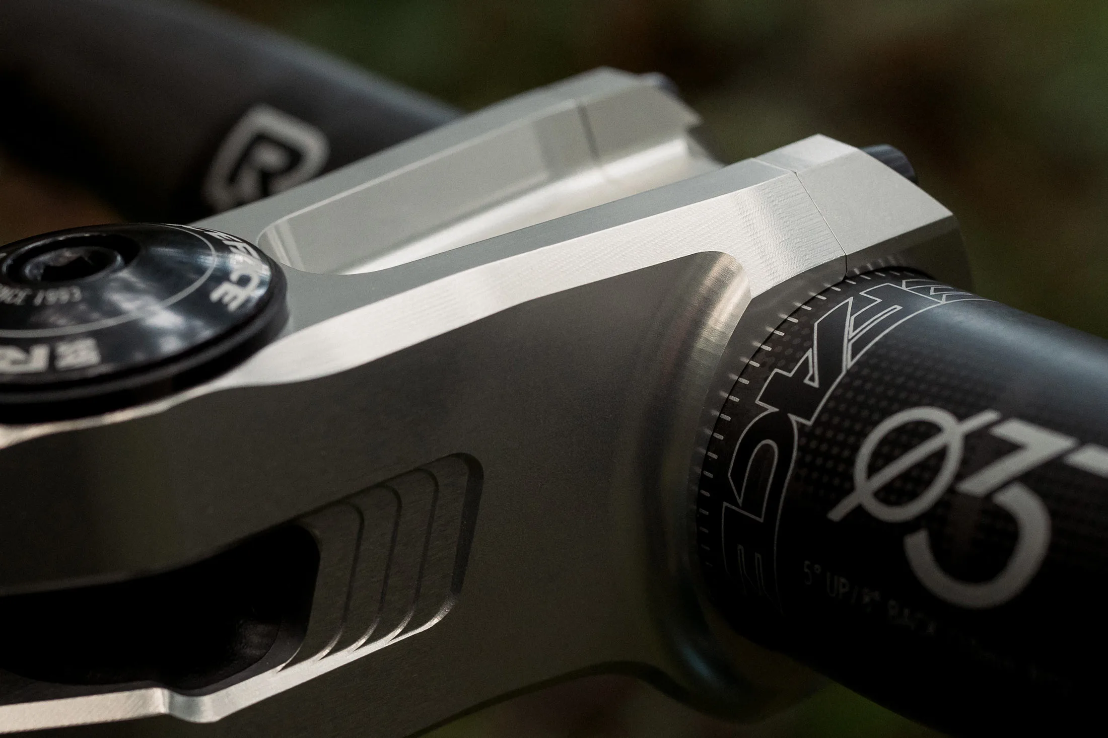 closeup details of race face turbine SL stem shown on a mountain bike.