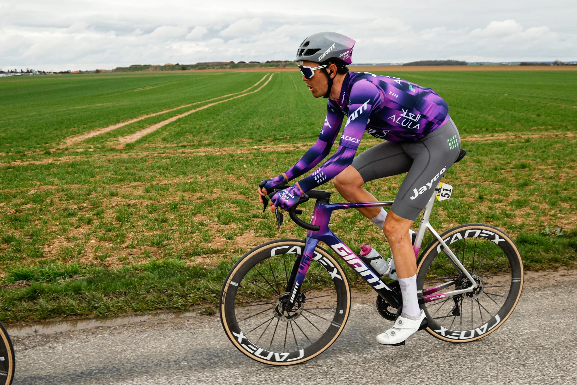 Ben O'Conner races through farmland on the Cadex Amp 3D saddle