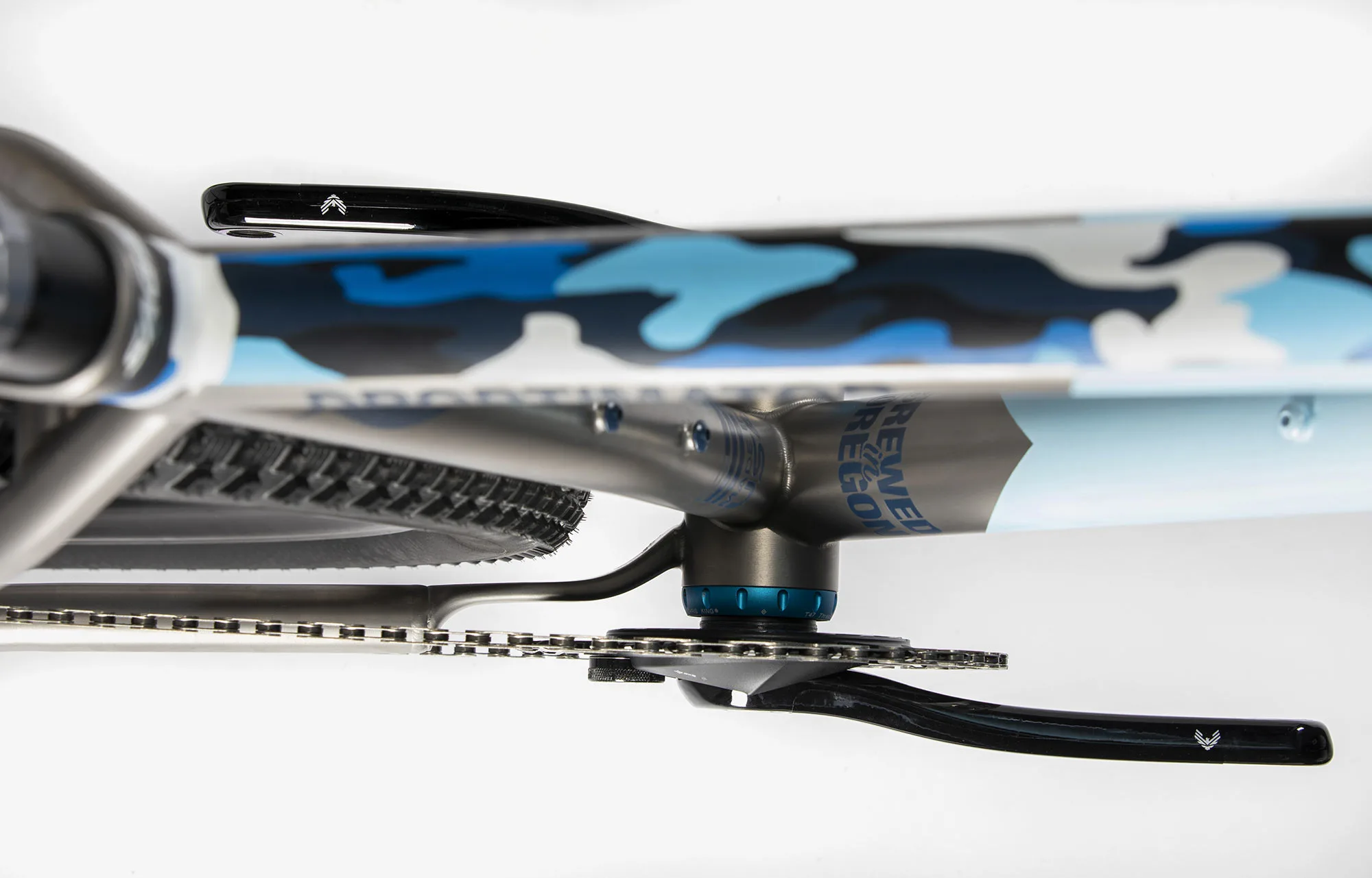 closeup details of sage droptimator drop bar mountain bike chainstay yoke.