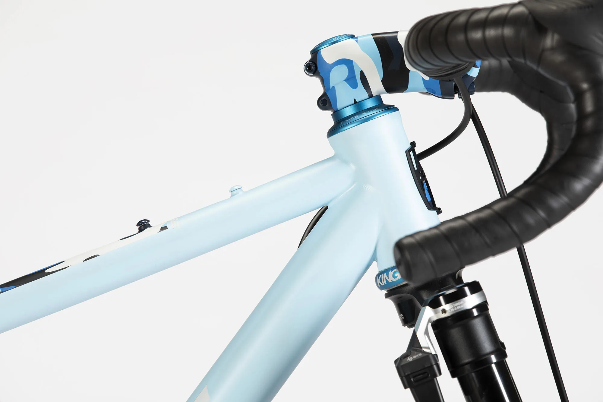 closeup details of sage droptimator drop bar mountain bike headtube.