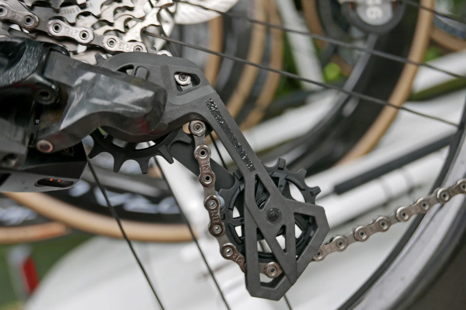 Campagnolo Super Record 13 Wireless SC prototype 13-speed derailleur at the 2025 Giro d'Italia carbon cage & pulley detail