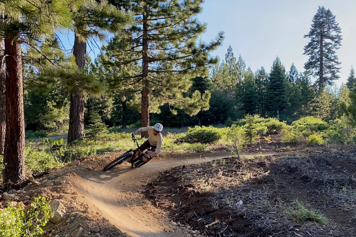 Riding on a mountain bike trail while testing the Julbo Density glasses.