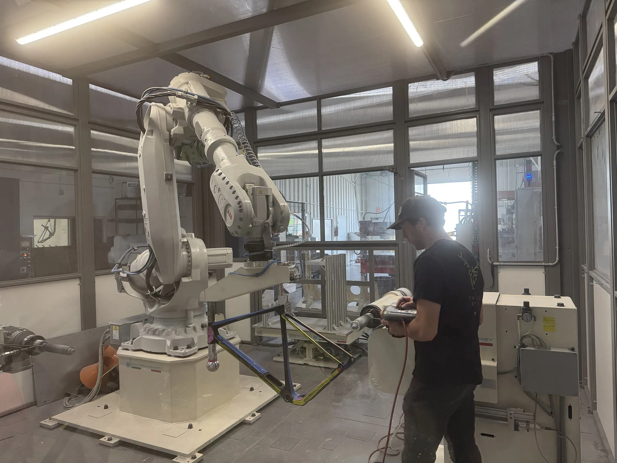 allied cycles HQ tour robot sanding room.