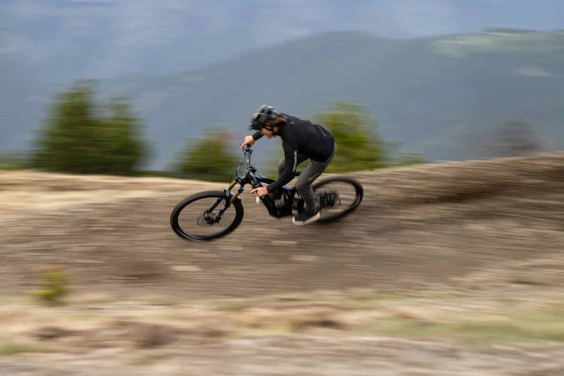 2026 commencal meta sx800 e-mtb being ridden through a berm.