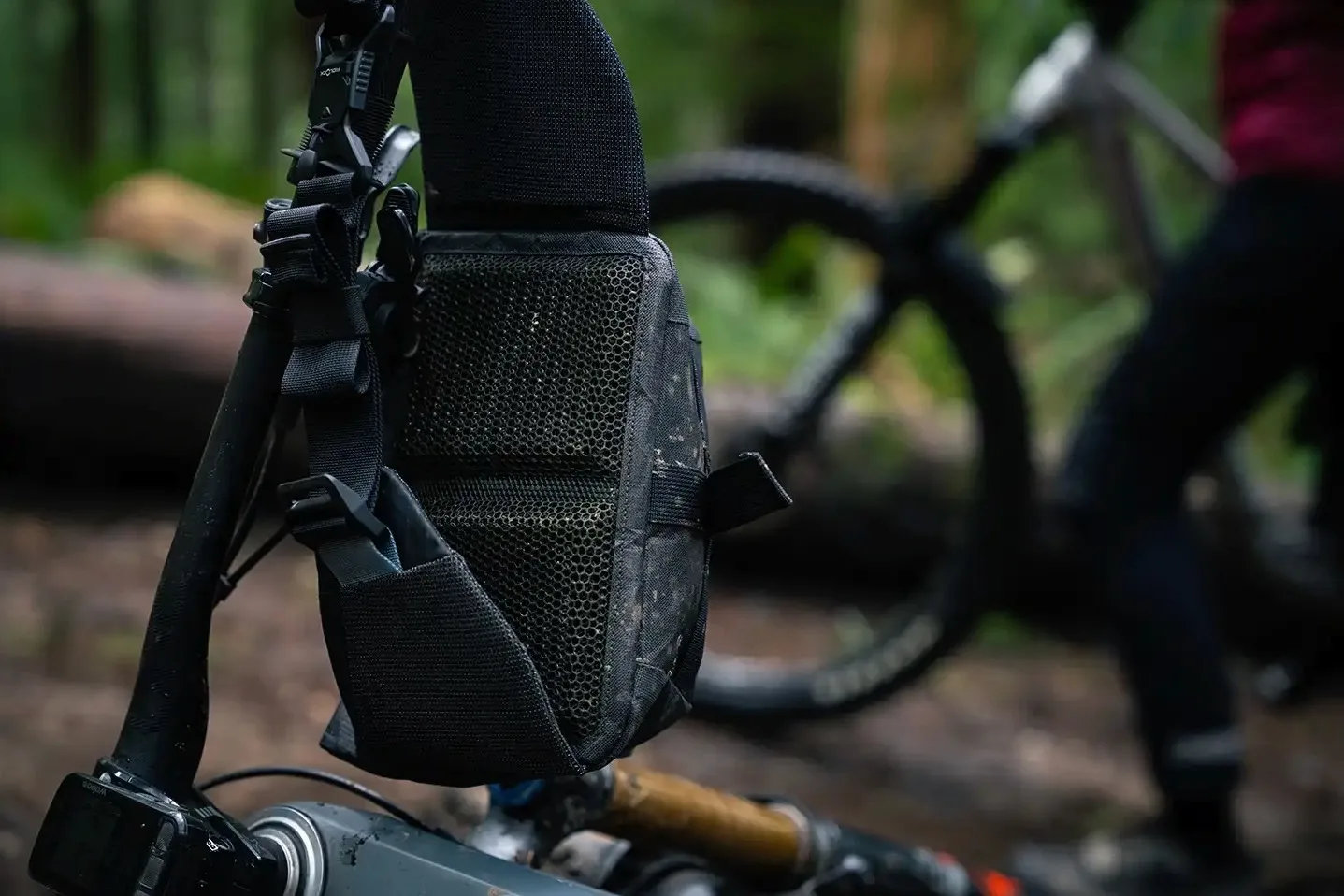The High Above venture 3D hip pack hanging from a handlebar