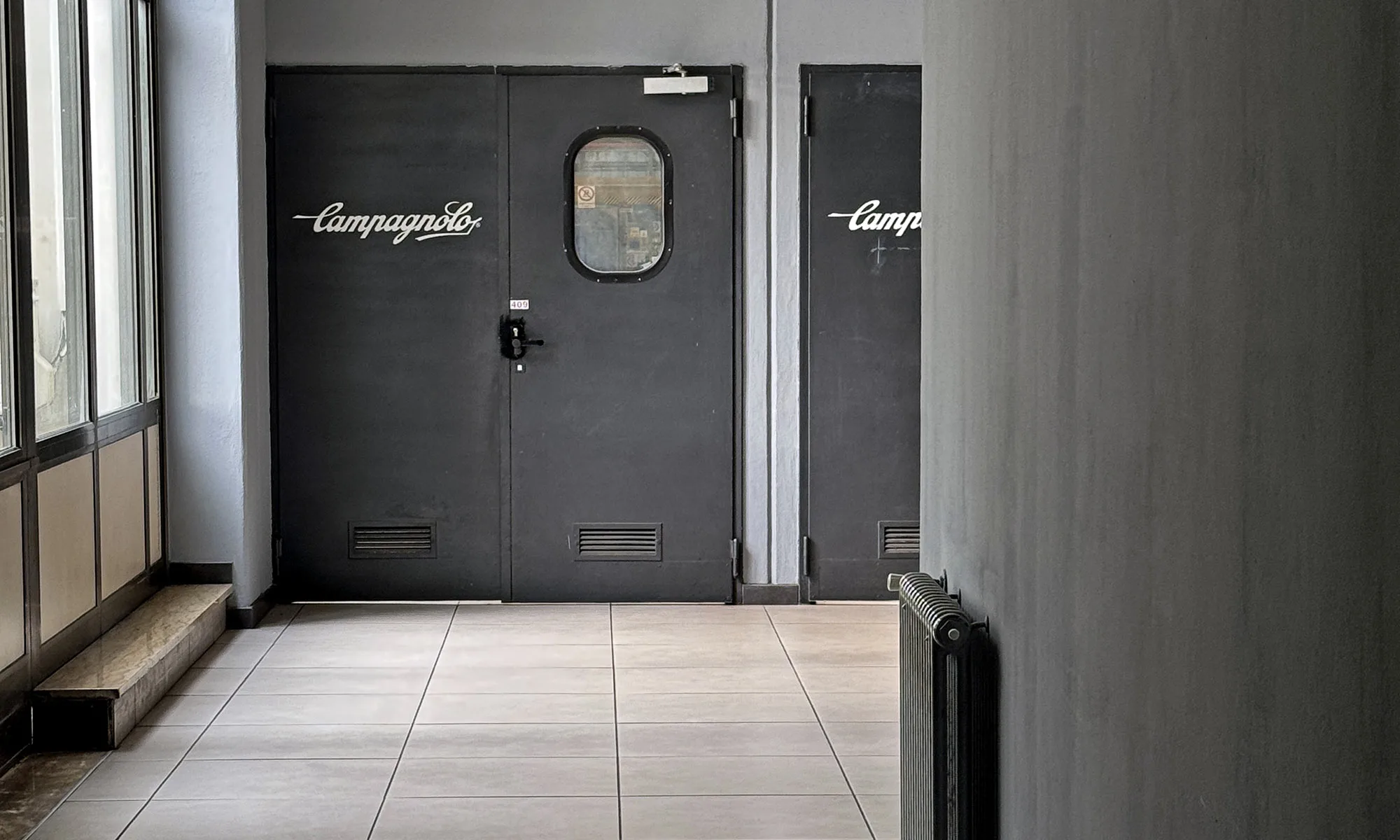 what happens inside the Campagnolo Vicenza, Italy HQ & factory, behind the iconic gray doors