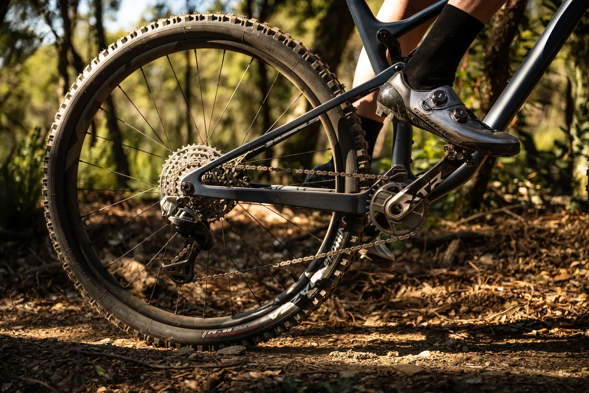 Someone riding with the new Shimano XTR pedals and special edition XC903S shoes