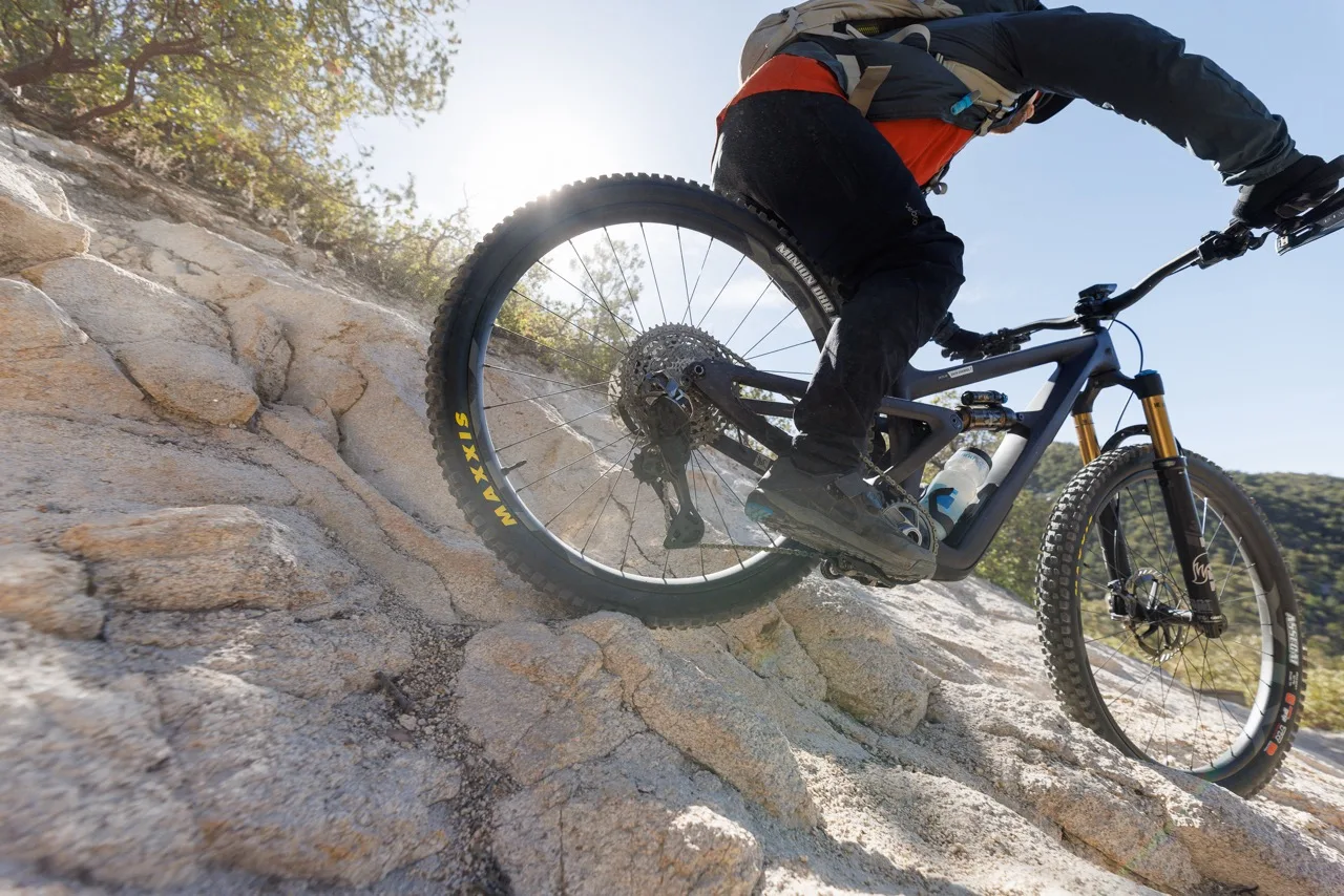 Riding down rocks Shimano XTR Di2 on Ibis Ripmo