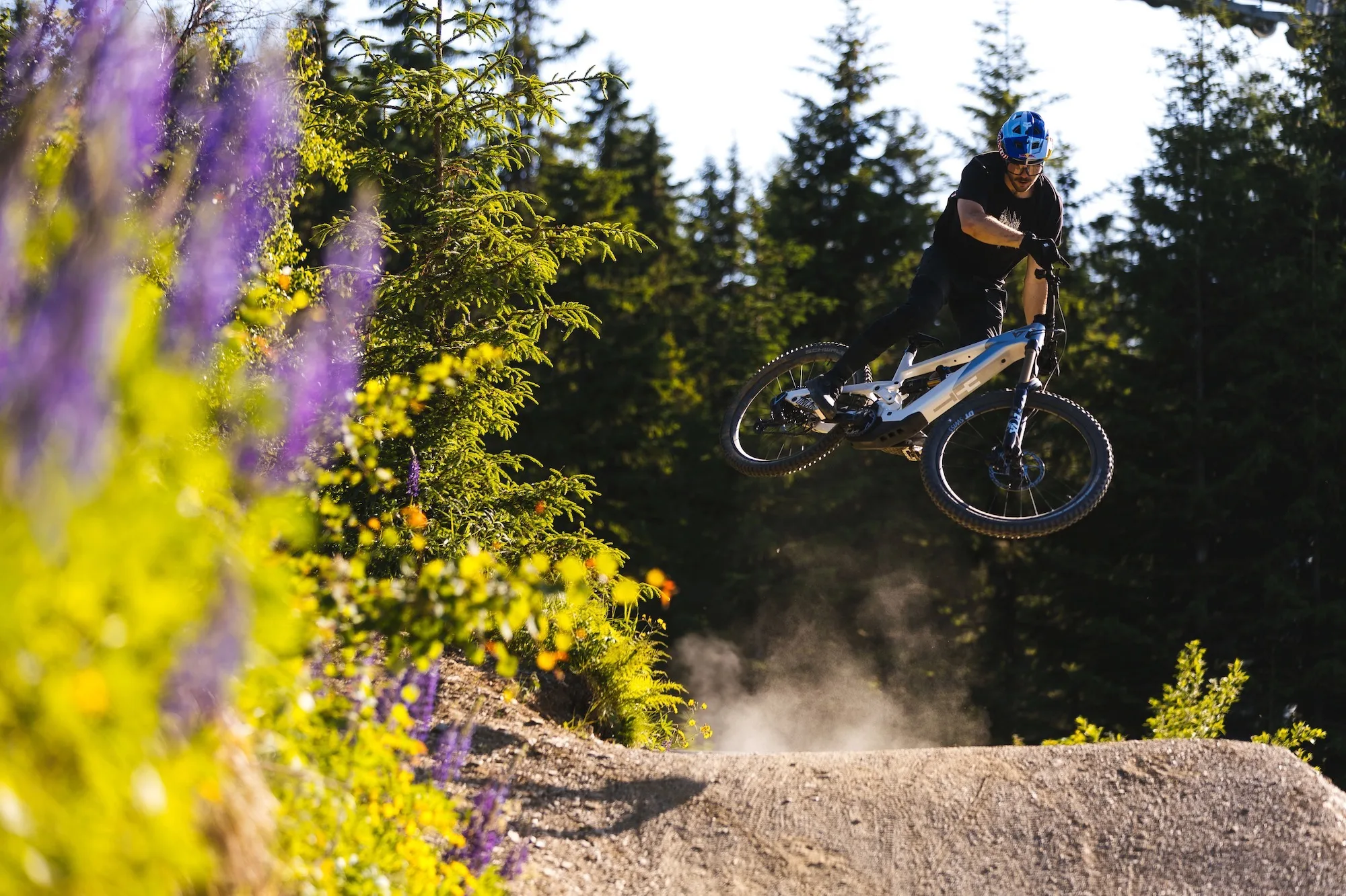 Stock image of a rider jumping on the new YT Decoy eMTB