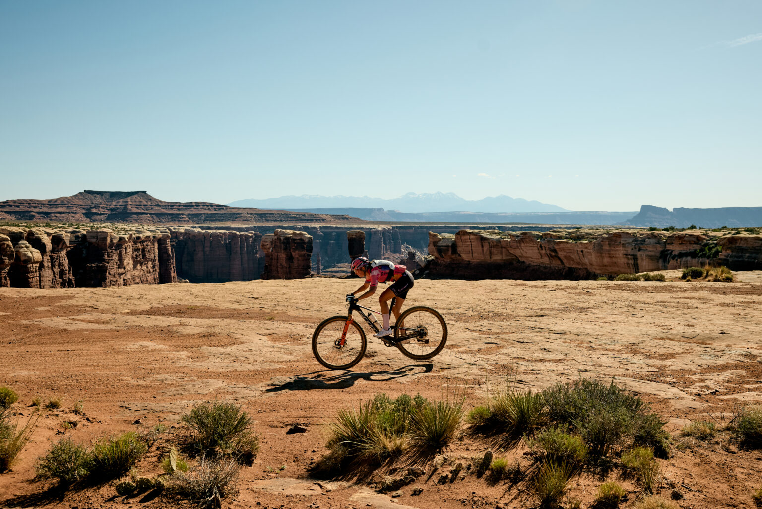Otto rides across canyonland mesas
