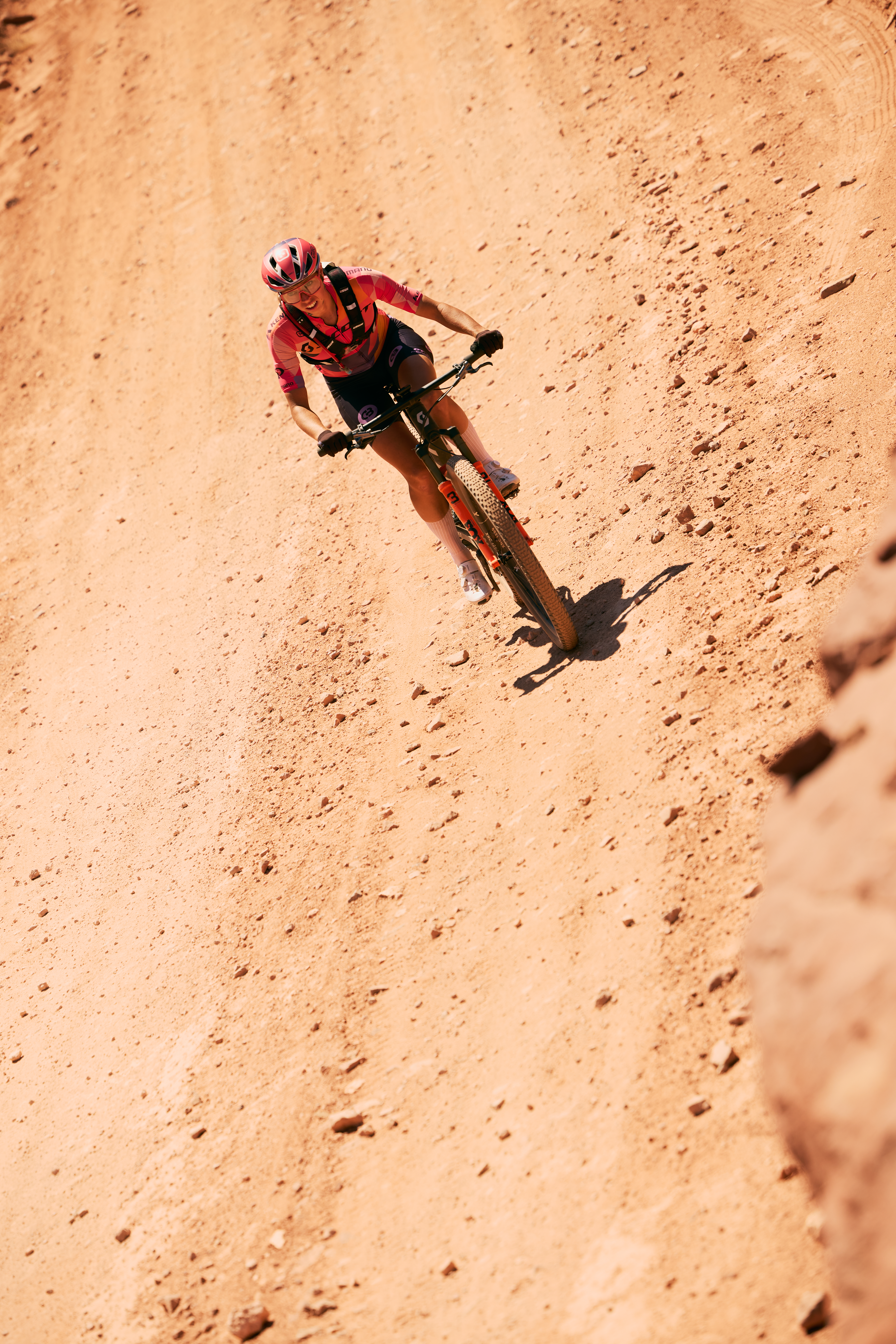 Otto riding in the desert heat on White Rim