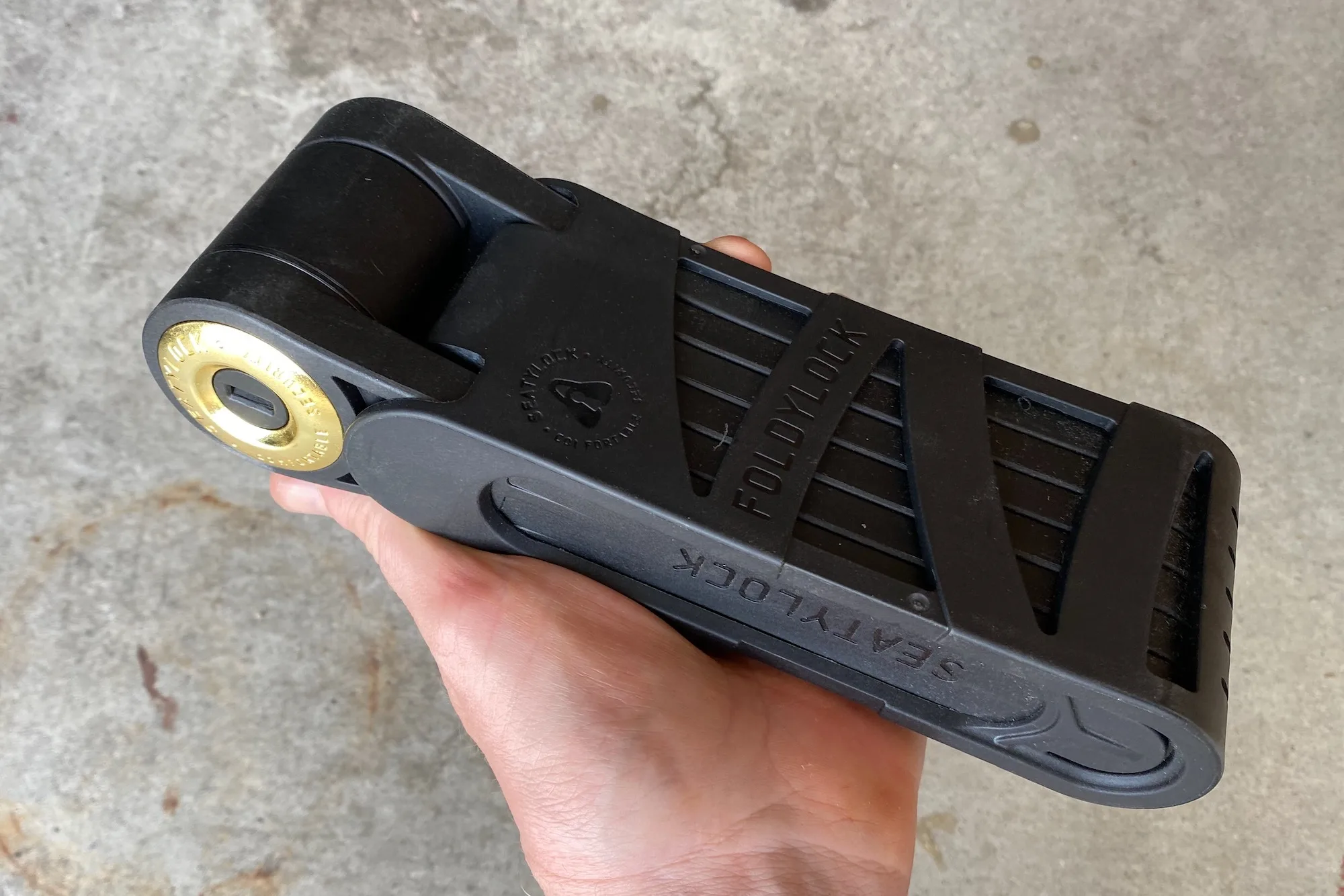 Holding the Foldylock Forever in hand to show its size