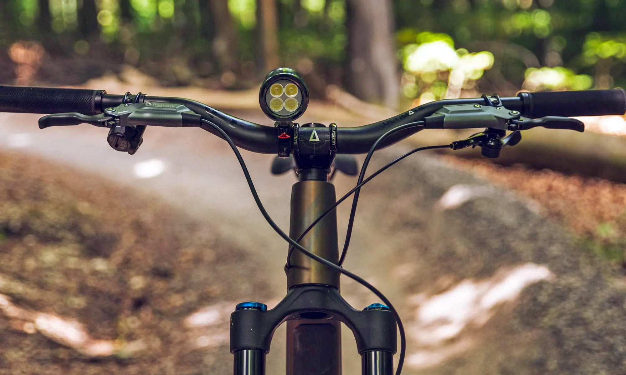 2025 Exposure mountain bike lights upgraded, on bar