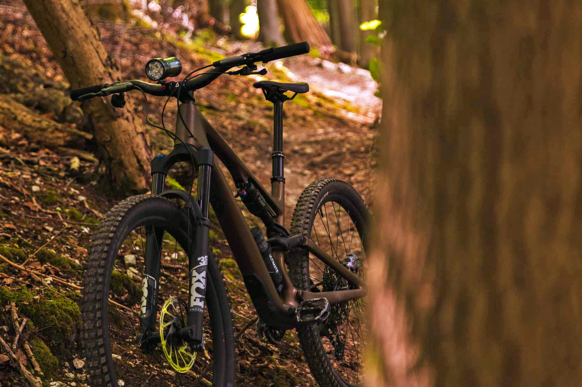 2025 Exposure mountain bike lights upgraded, on a bike in the woods