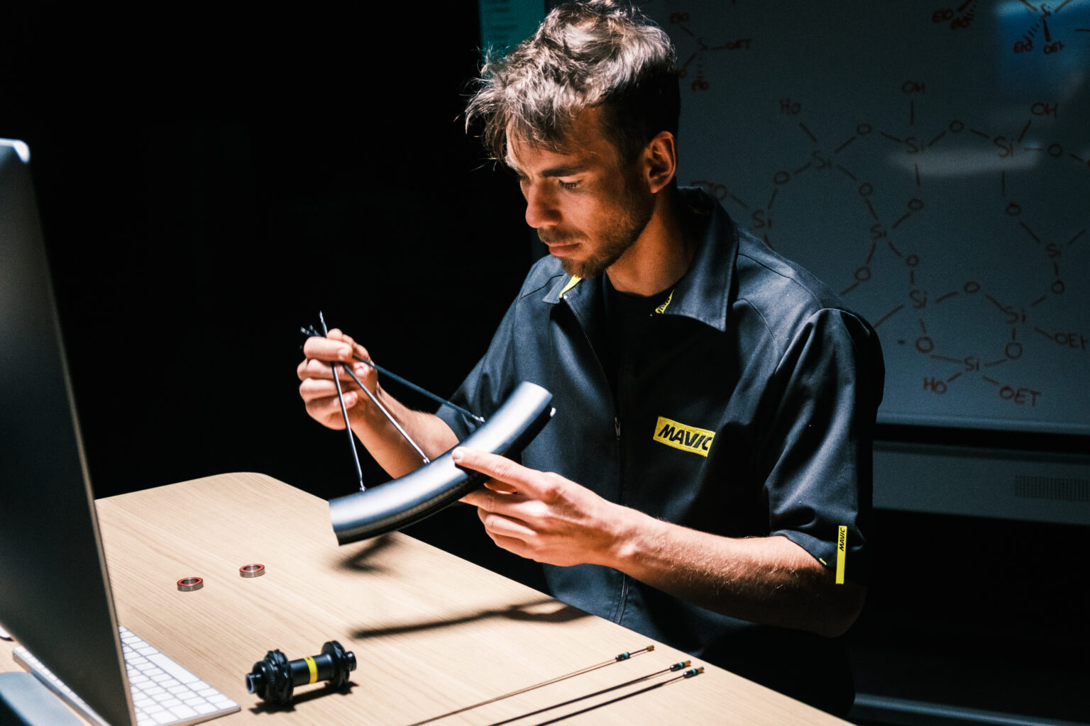 working on the spokes of the new Mavic Cosmic SLR