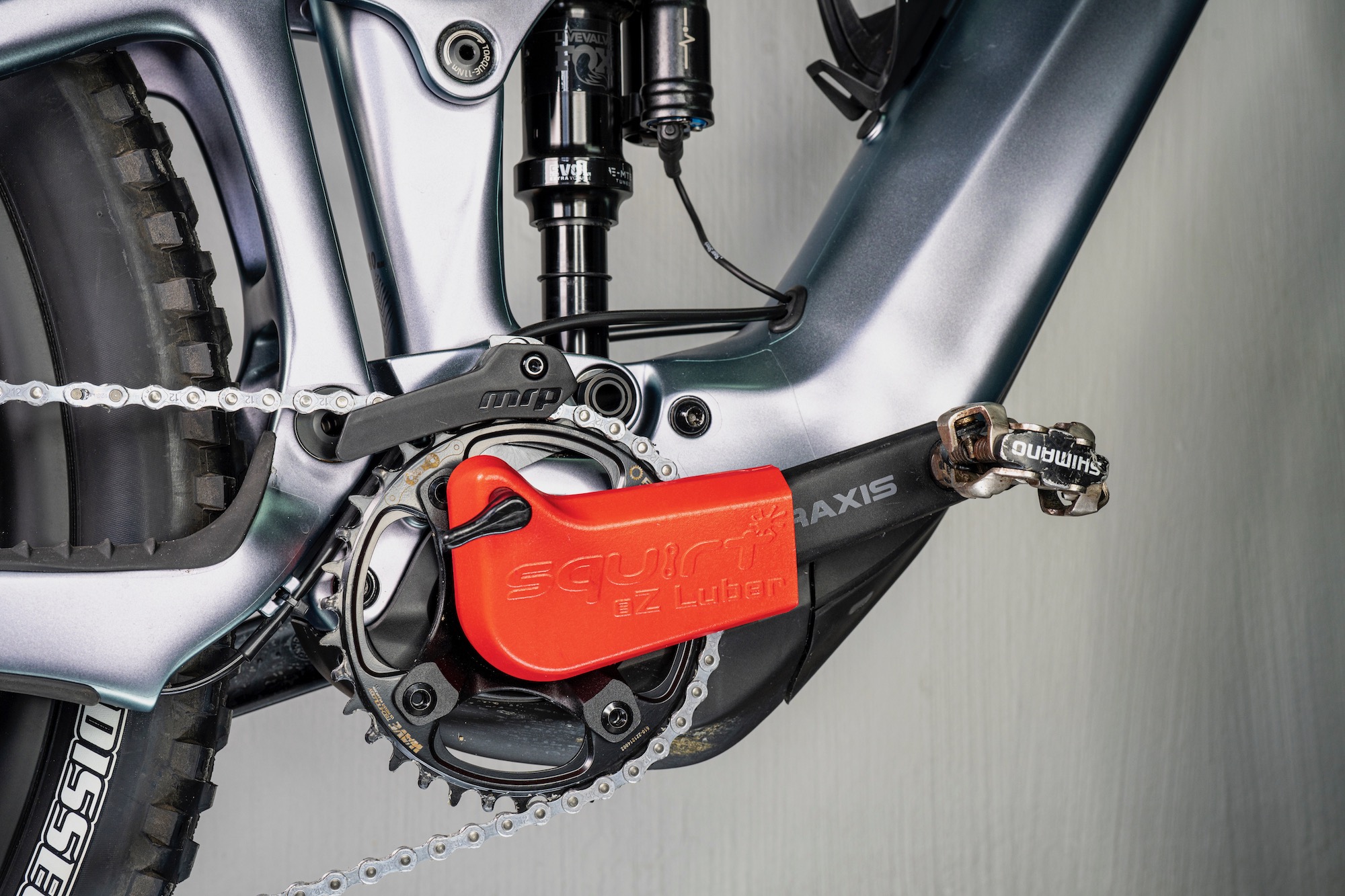 The Squirt eZ-Luber attched to an ebike crank