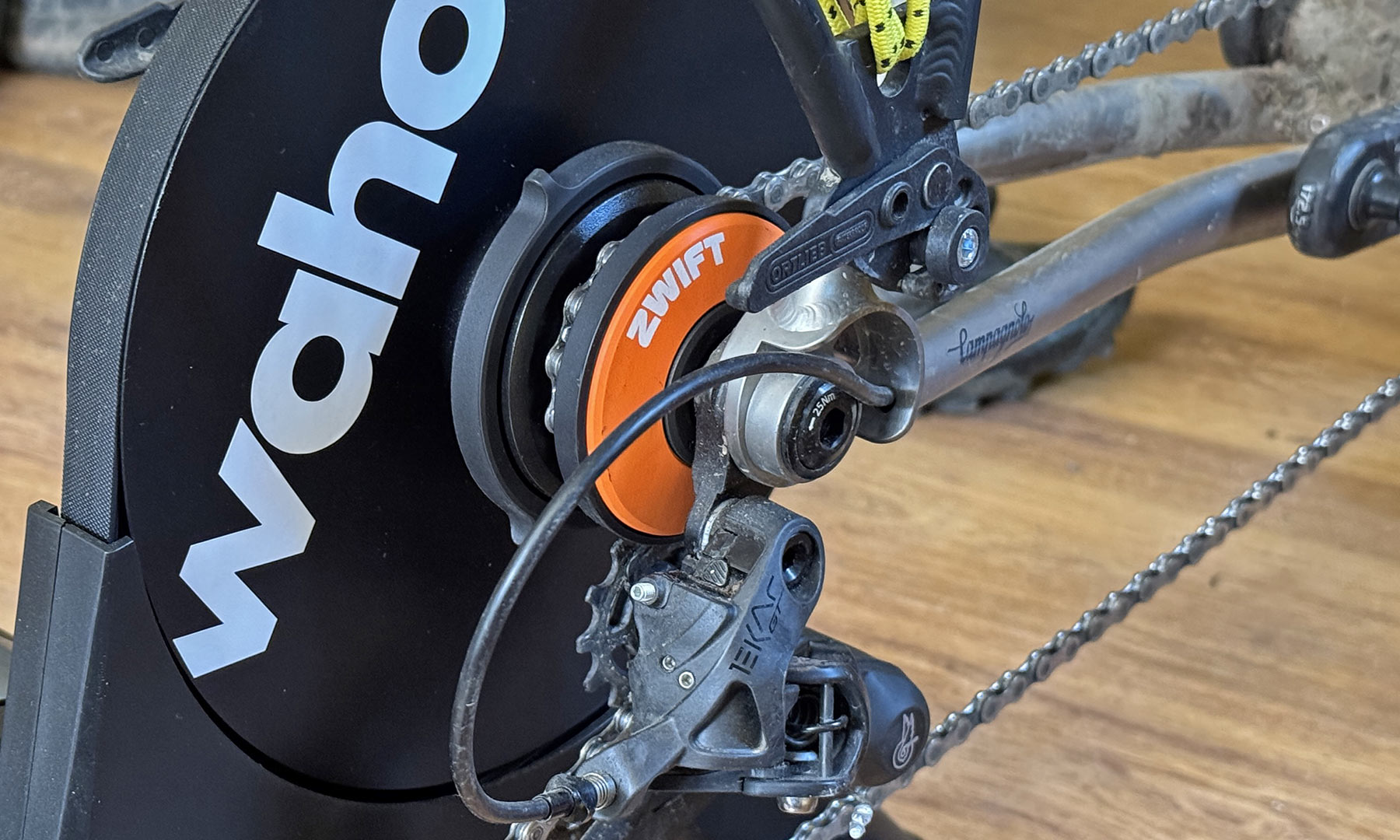2025 Zwift Click v2 virtual shifting in-game controllers paired with simple Zwift Cog at lower price, on Wahoo Kickr trainer