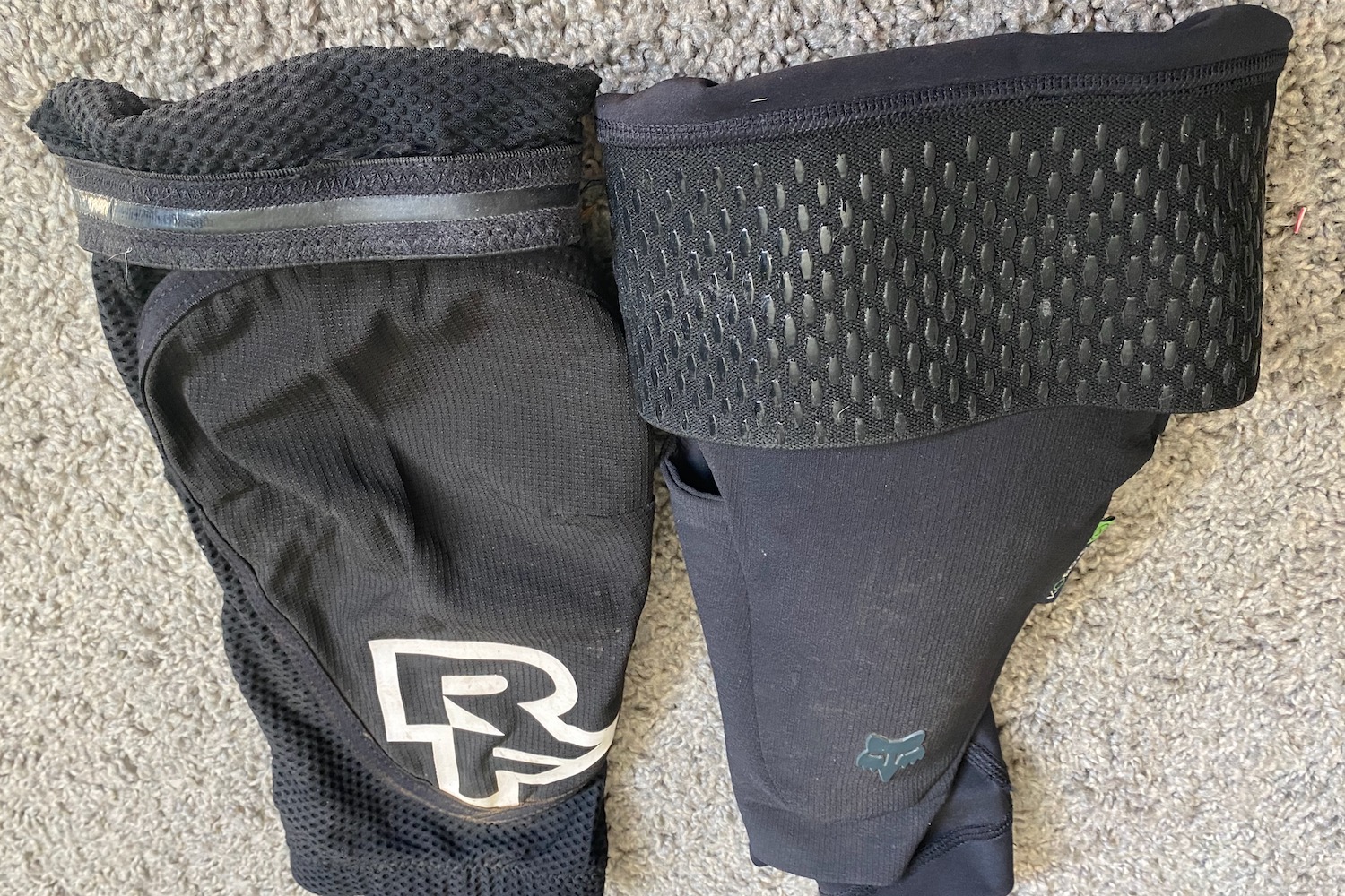 comparison photo of the leg grippers of the Race Face Covert and the Fox Enduro Pro knee guards
