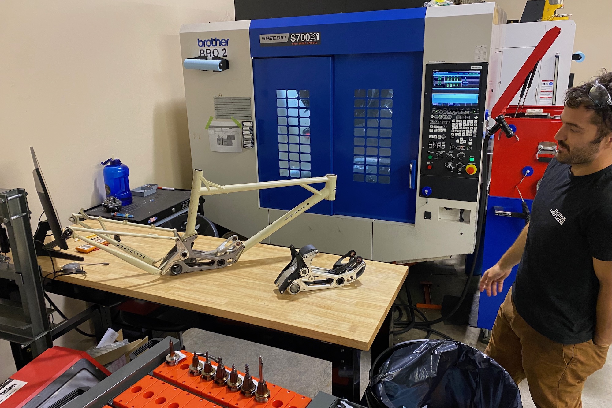 collin Huston with one of the 5-axis CNC machines in his shop