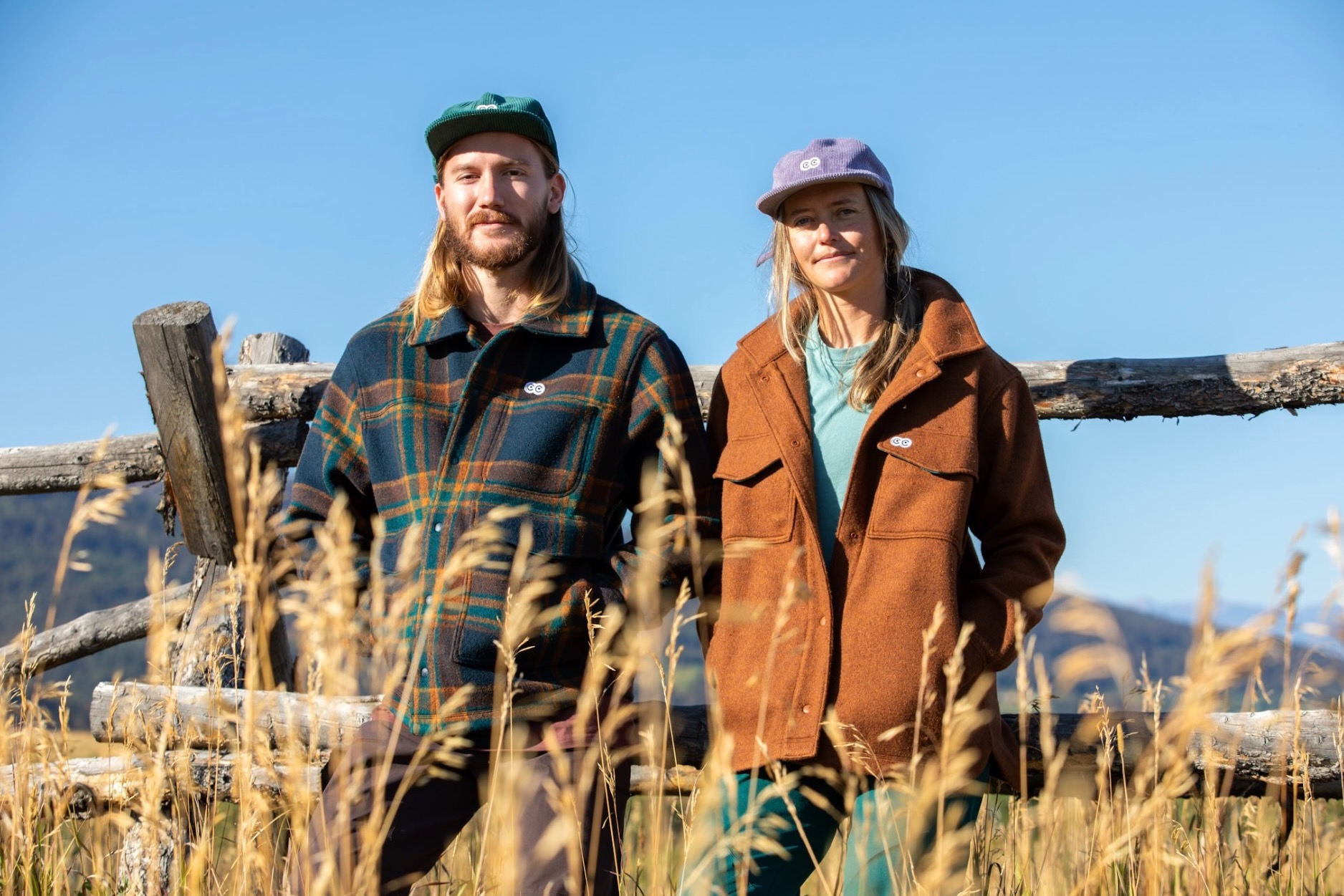 A man and woman wearing the new Curious Creatures Hungry Horse Jacket