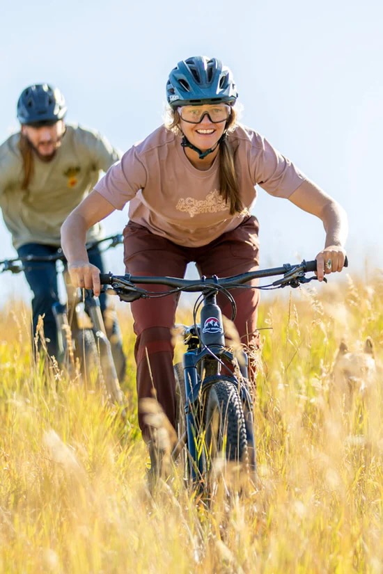 a woman riding in the new Ramble Scramble pant