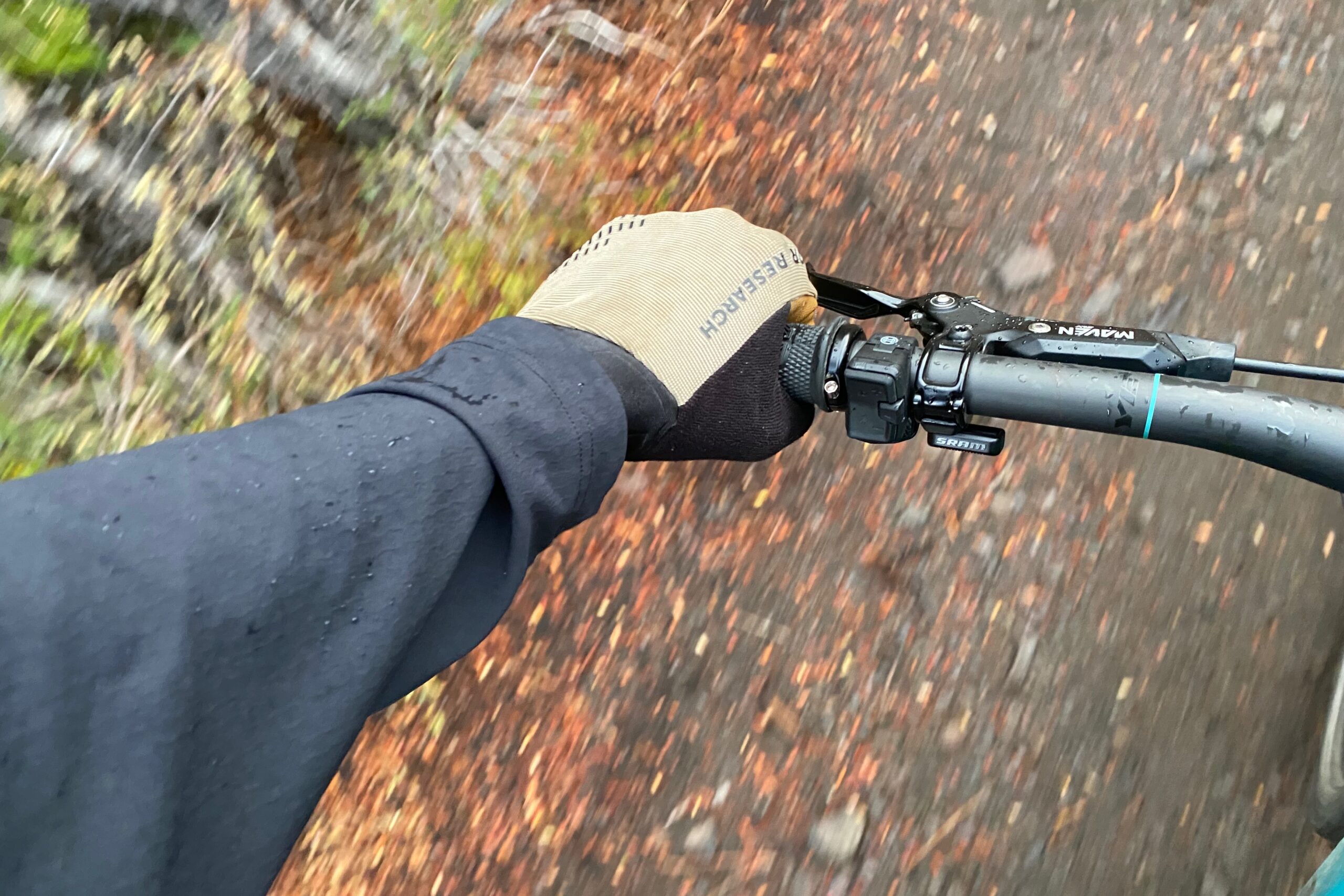 picture of the sleeve of the Freewheel Hoody while riding in the rain