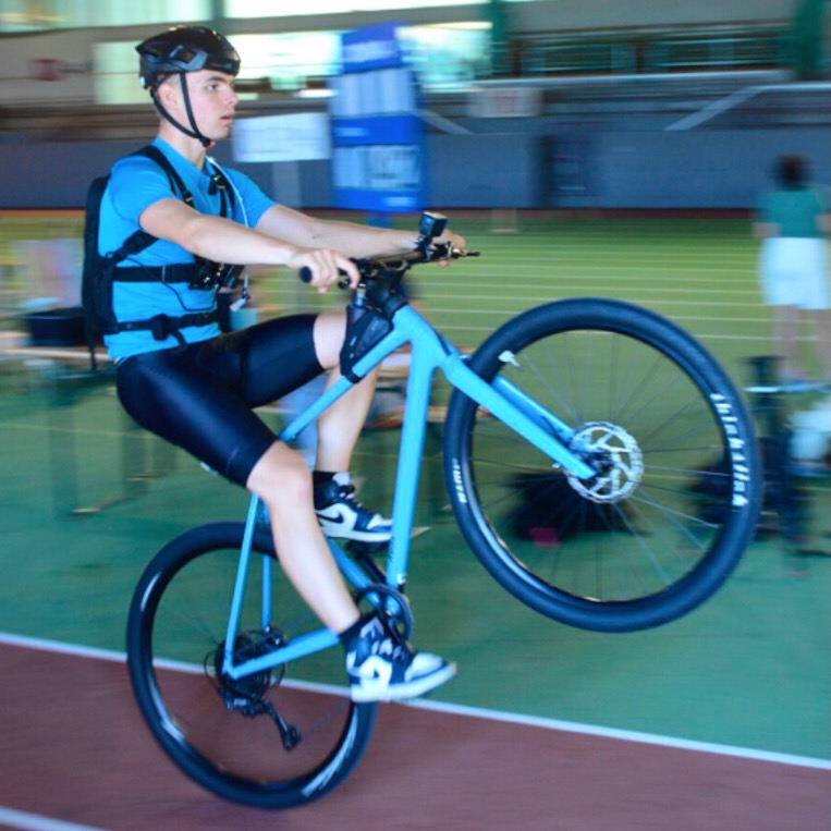 Oscar delaite riding a wheelie to a new world record.