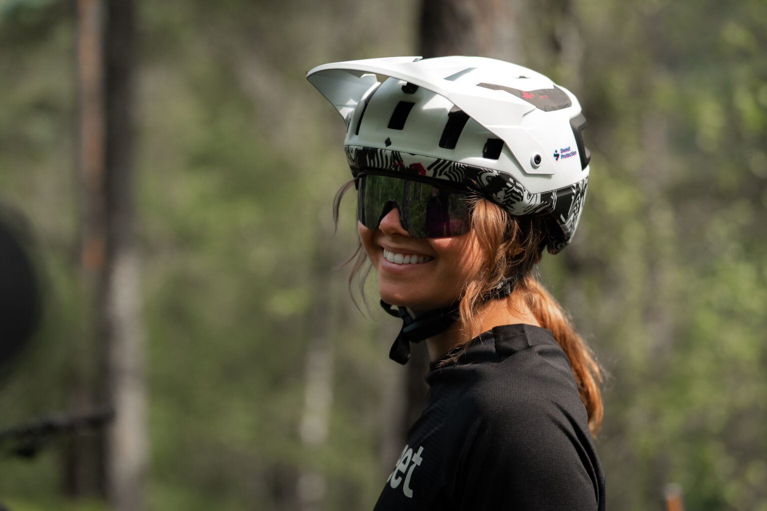A rider wearing the 25th anniversary Block Party Bushwacker helmet