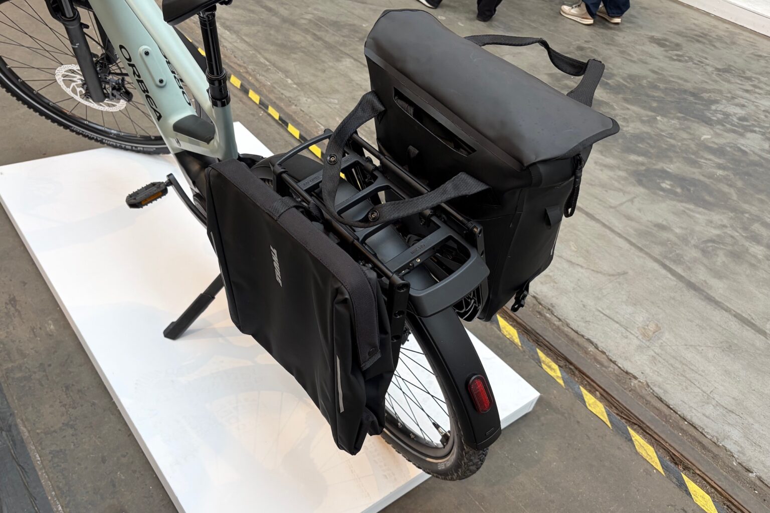 2 of the Inlock pannier bags mounted on a bike with the cargo one closed