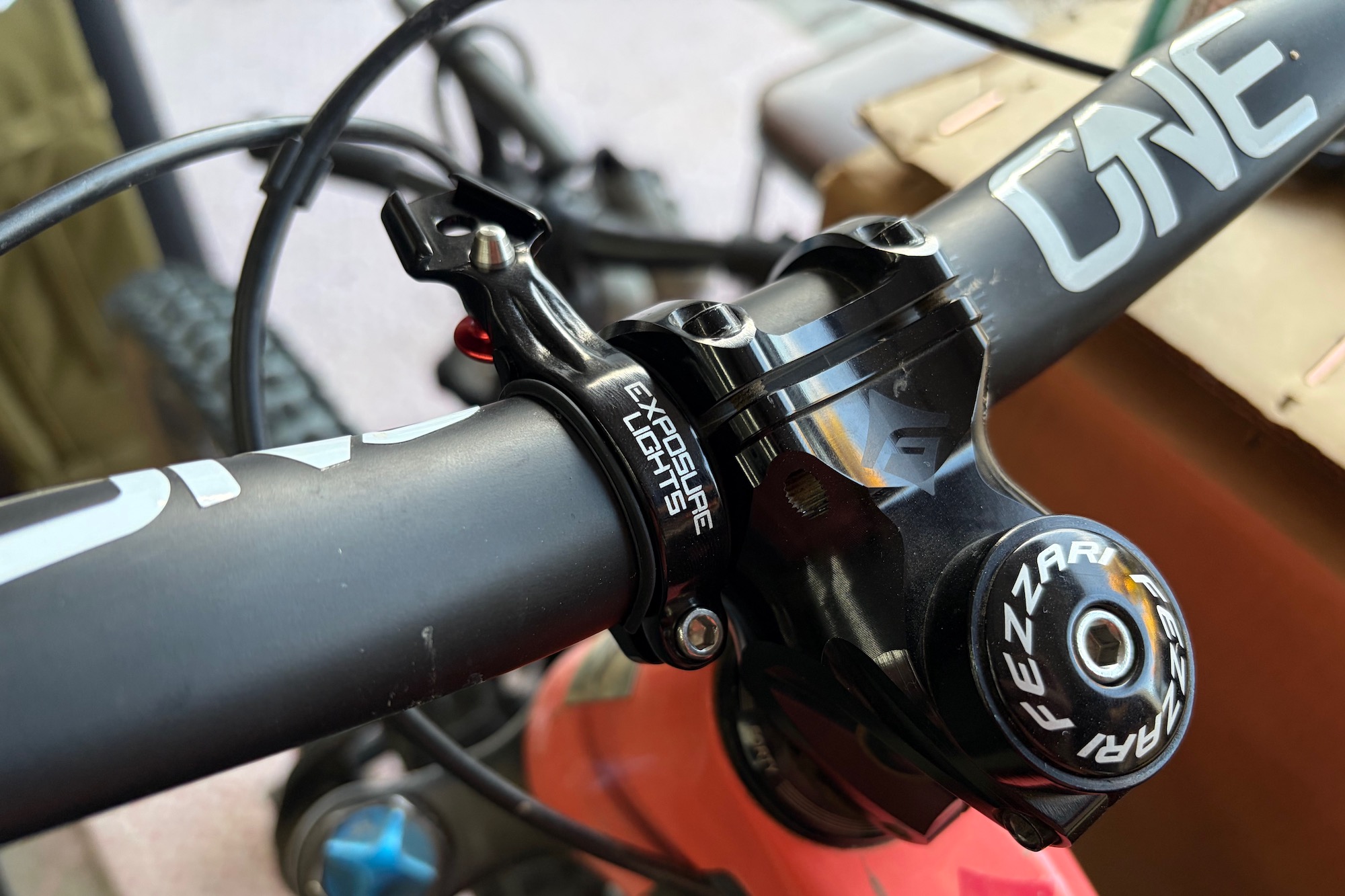 the handlebar mount for the Six-Pack 15 attached to a mountain bike handlebar without the light attached