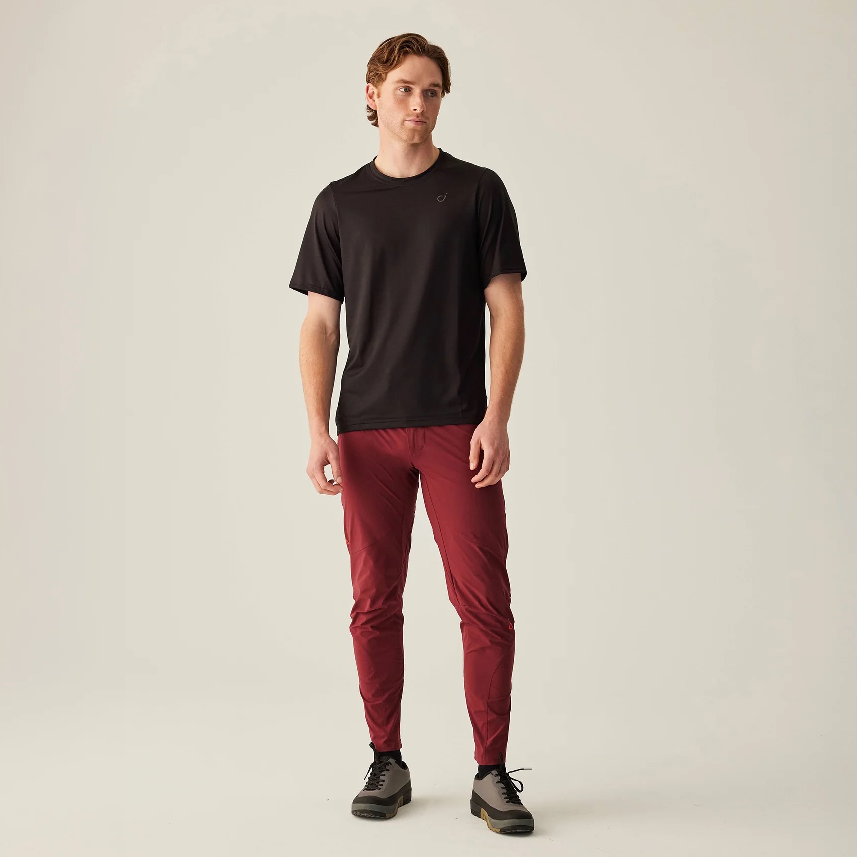 studio image of a man wearing the Velocio Ultralight Trail pants from the front