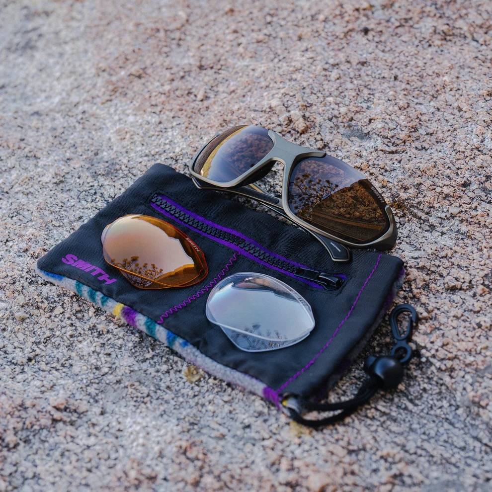 the smith sliders sunglasses with a storage case and spare lenses.