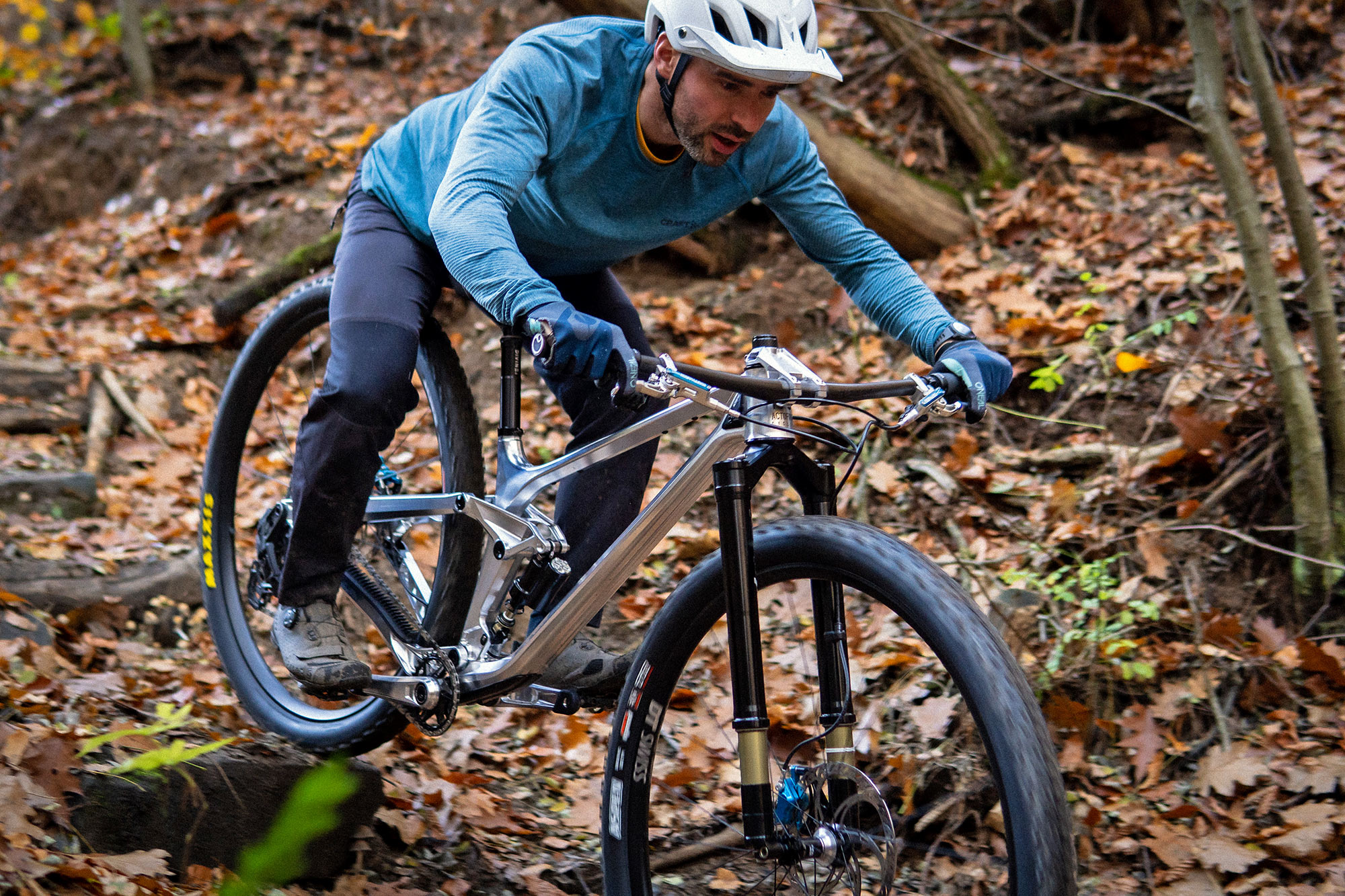Actofive I-Train 32" CNC-machined alloy full-suspension trail bike, Simon dropping in