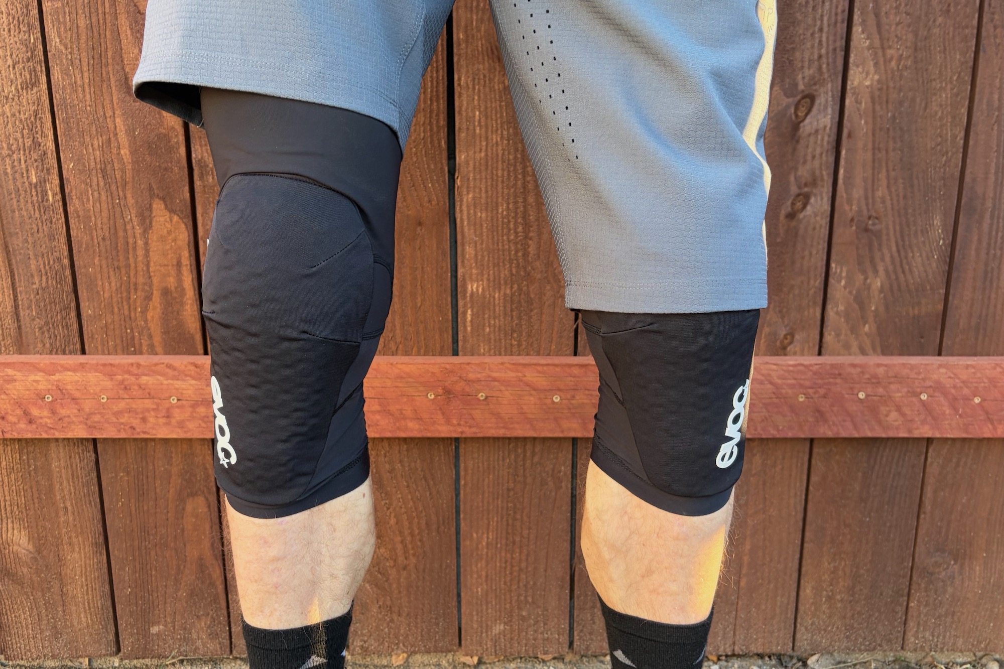 wearing the LS Flex Lite knee pads to demonstrate the fit and how they pair with shorts.