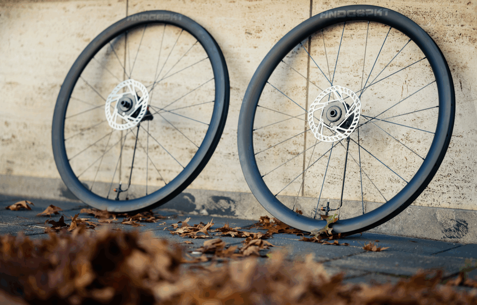Gravaa x Handgespaakt wheelset leaning up against a wall