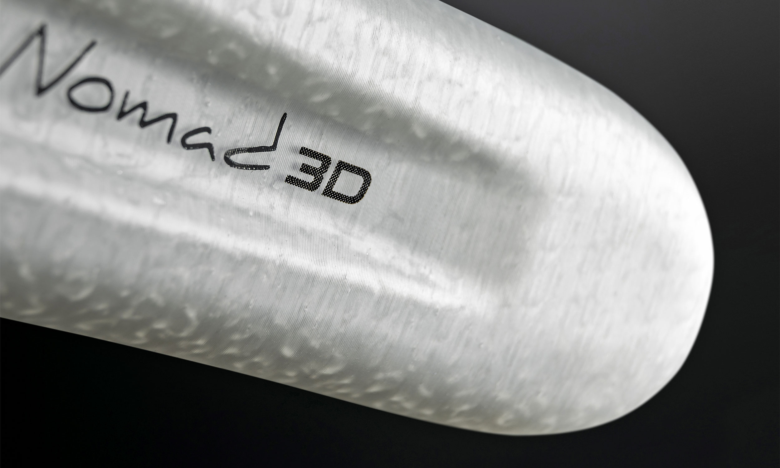 Repente Nomad 3D-printed lightweight full carbon saddle with smooth top, up close