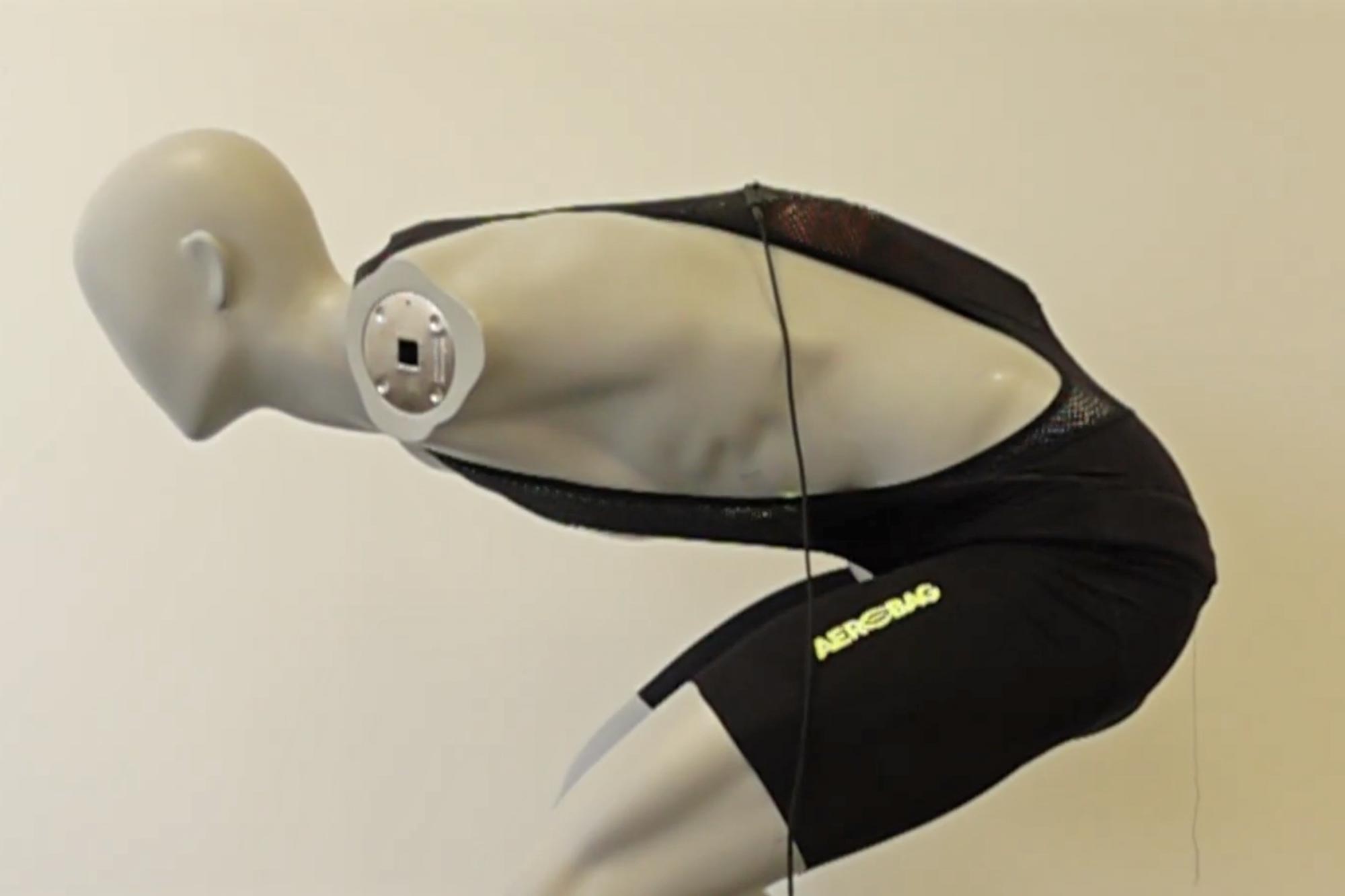 Aerobag ultralight compact airbag for performance professional cyclists integrated into your favorite bib shorts, side view before inflation