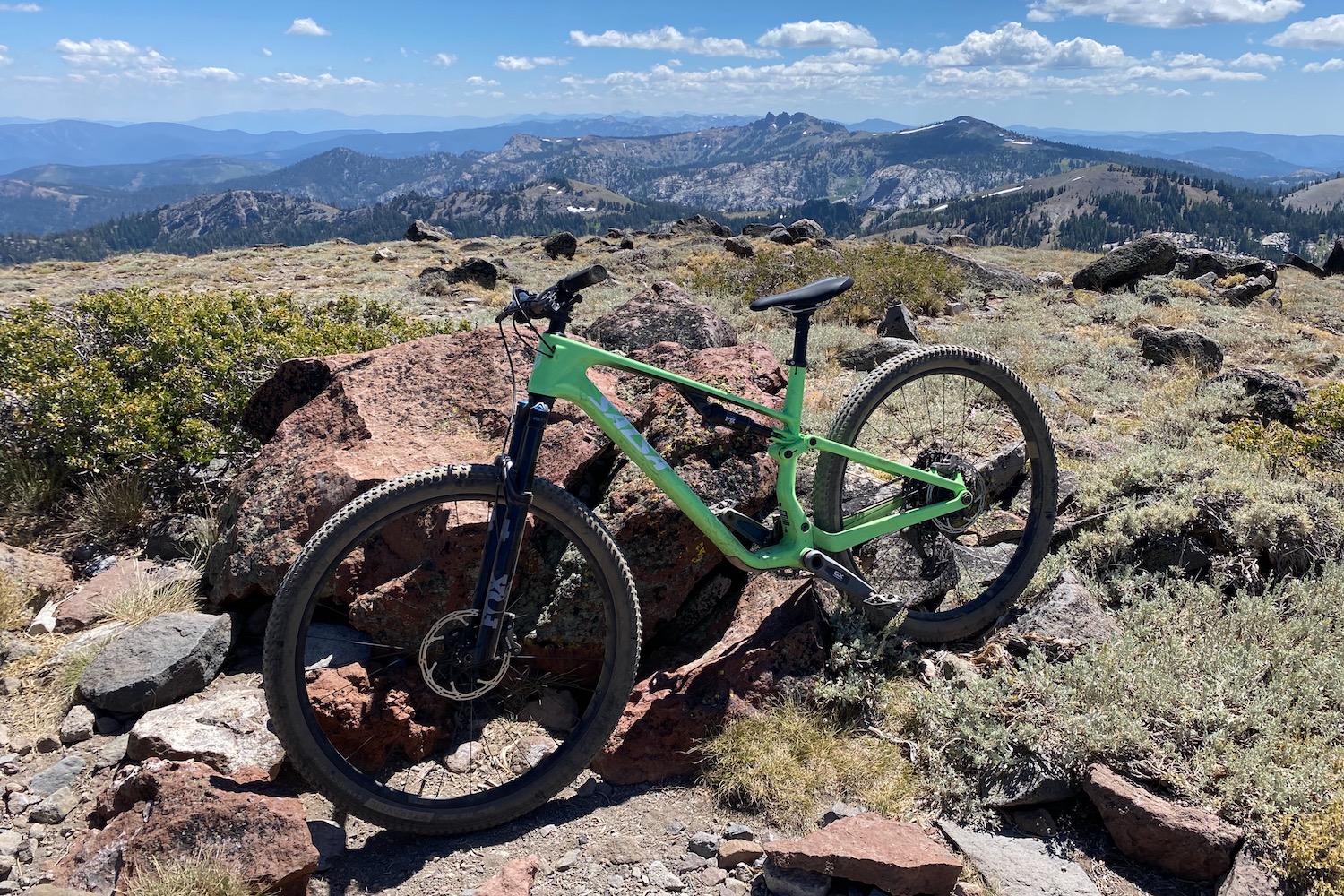 the Salsa Spearfish on a mountain top with more mountain in the background
