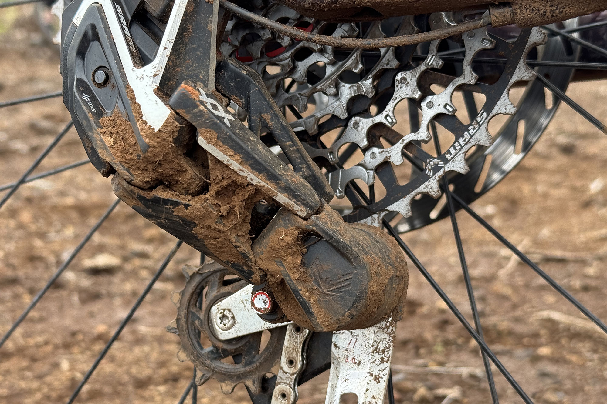 even a wired SRAM XX SL AXS T-type derailleur hits the ground every once in a while