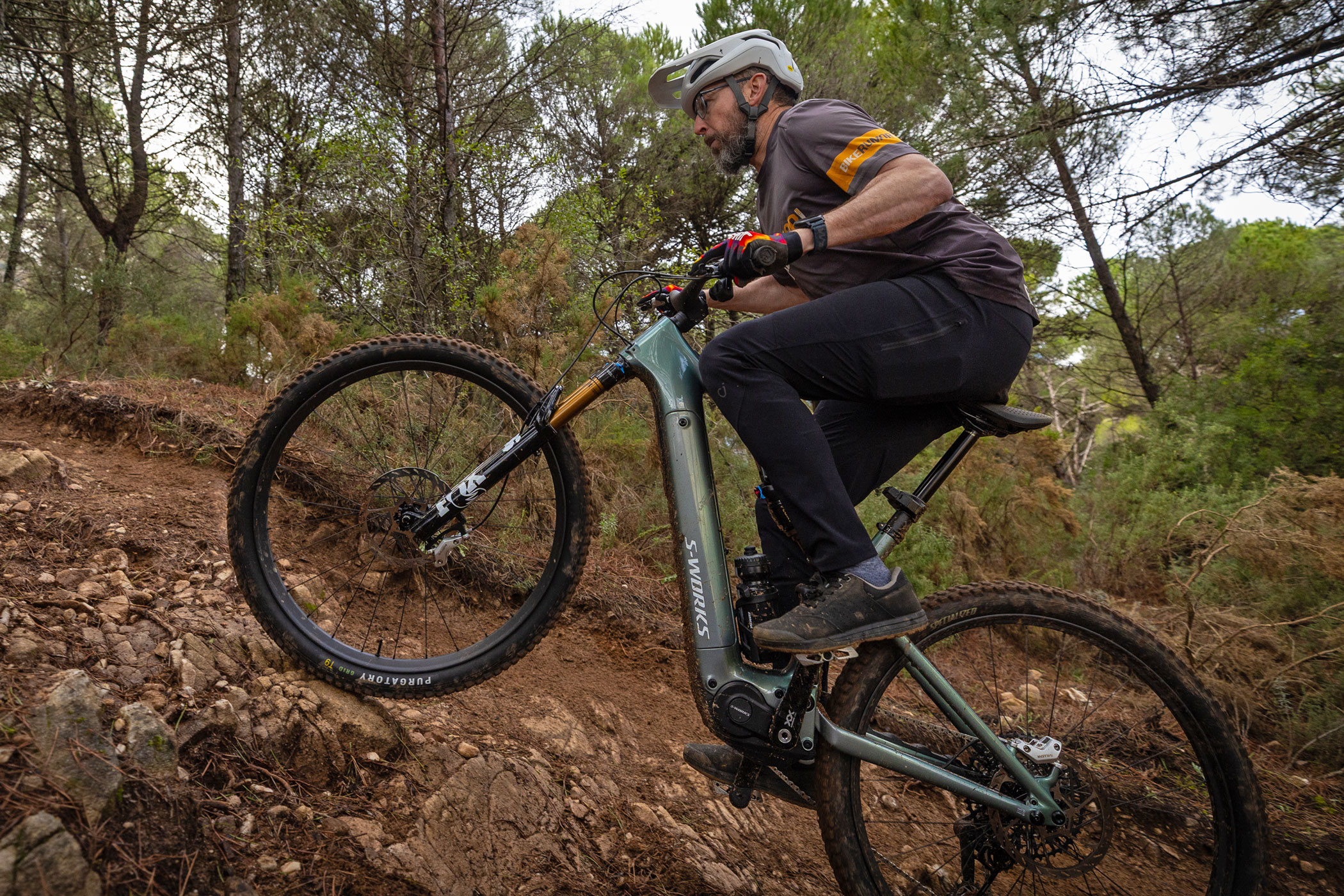 2026 Specialized Levo R lightweight carbon trail eMTB is a full power rally ebike, Cory climbing