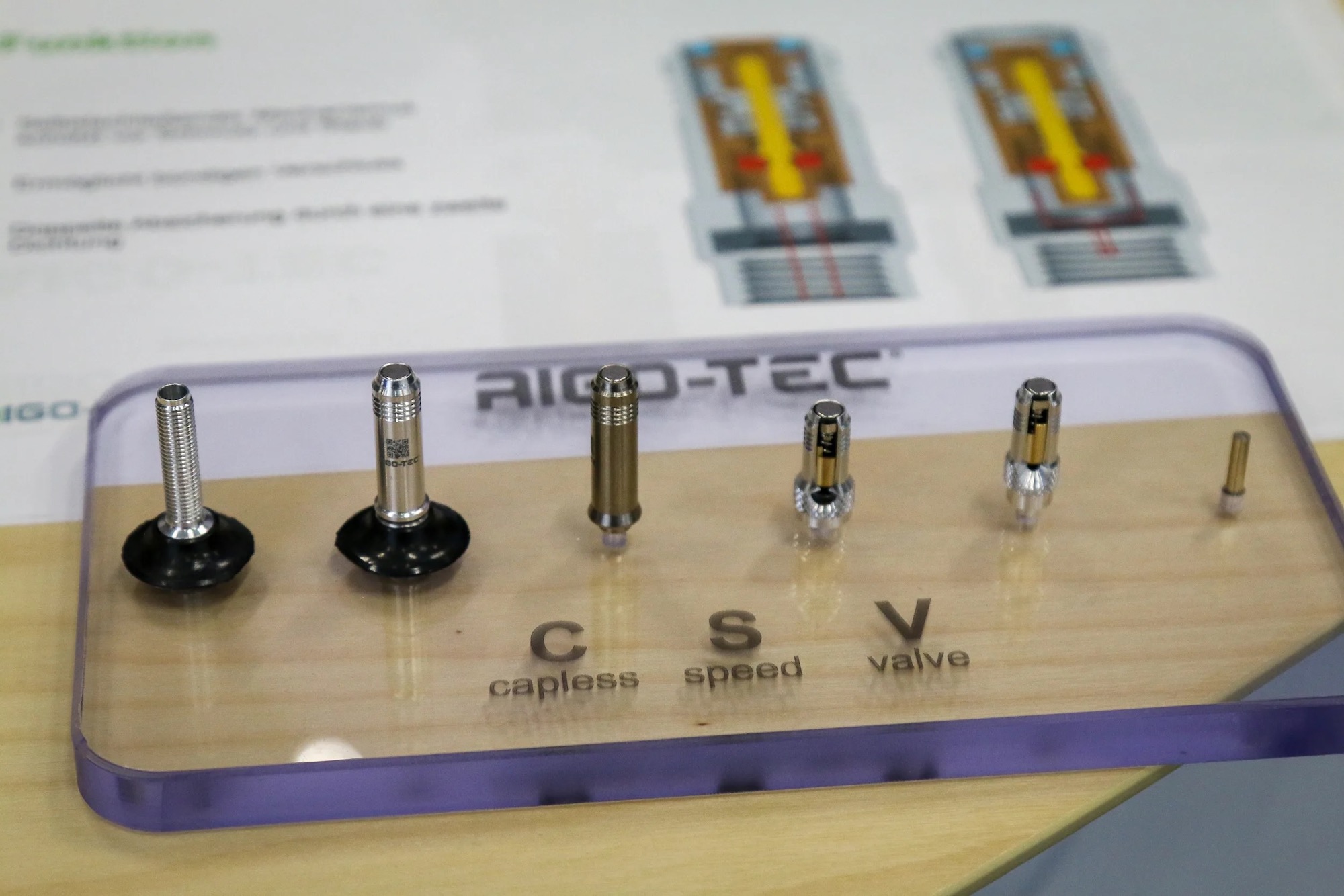 a presentation board showing the various parts and configurations of the Capless Speed valve.