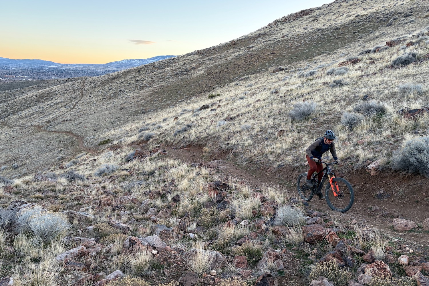climbing up a singletrack trail on the Norco Sight VLT TQ.