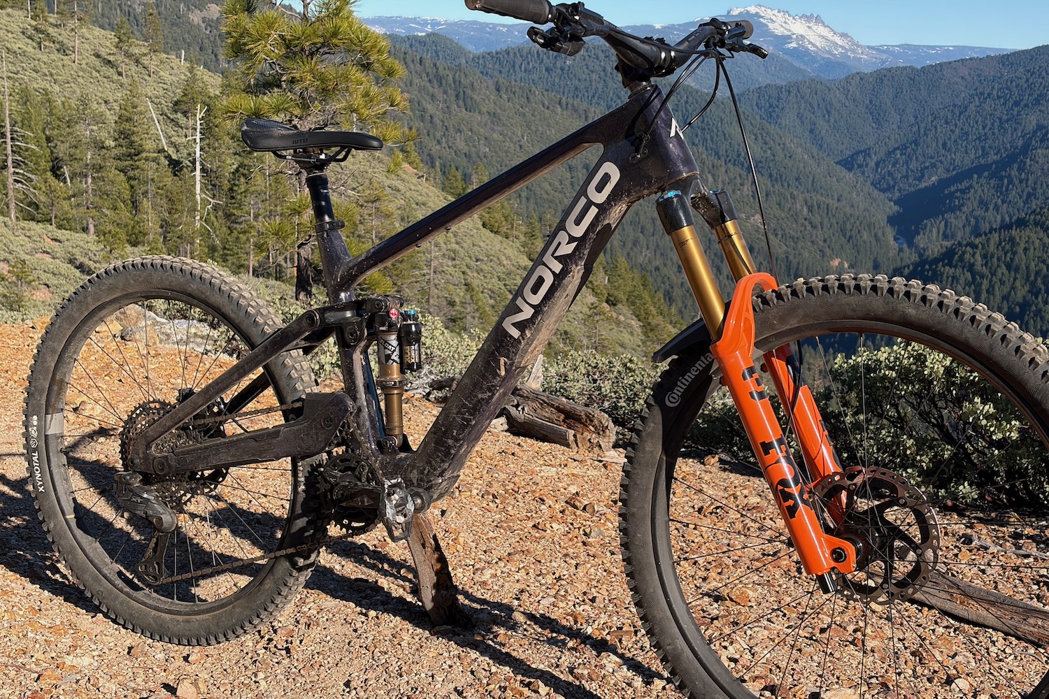the Norco Sight VLT TQ in front a a scenic view to show some of the components.